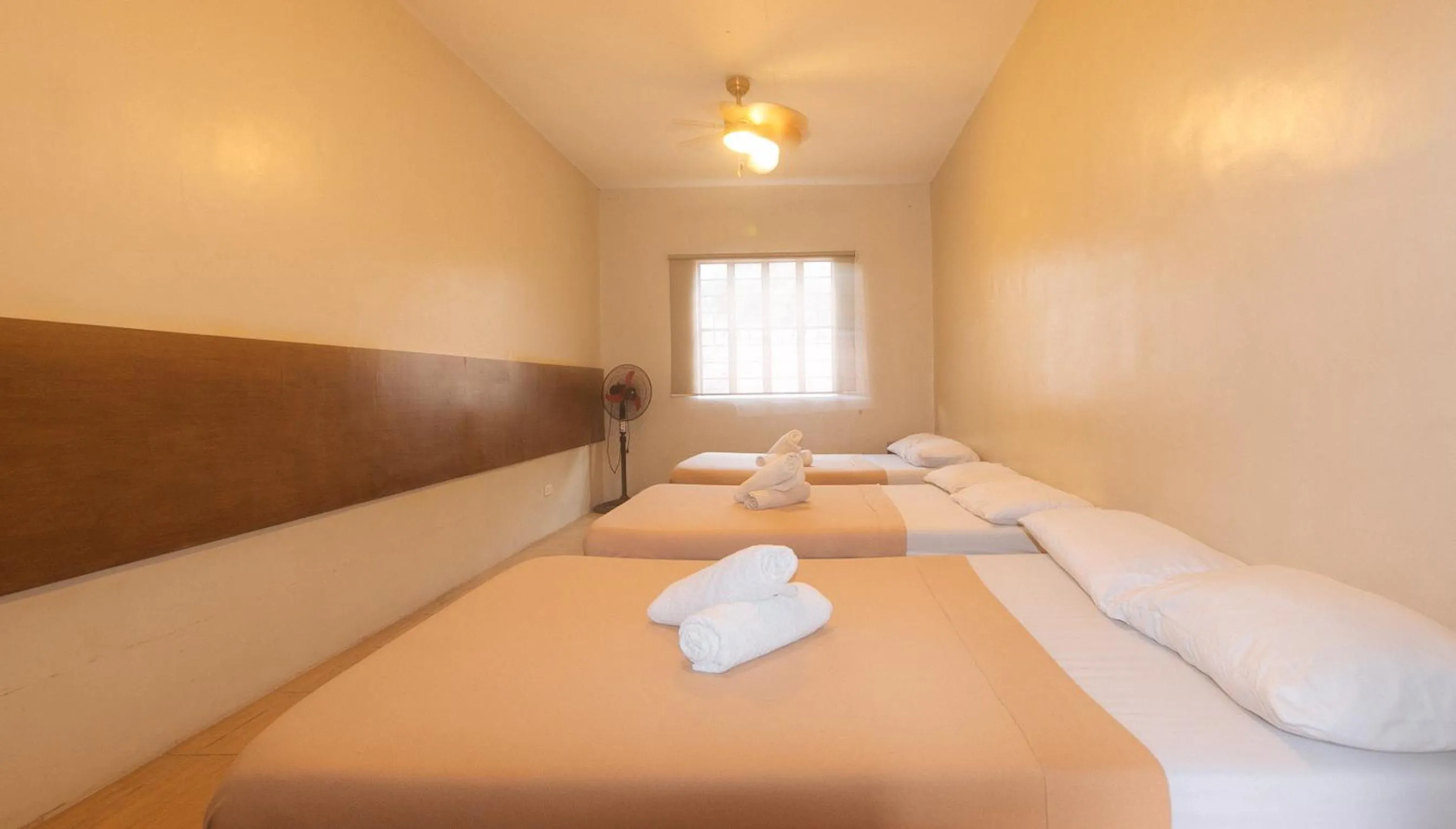 Bed in Metro Deluxe Residences near World Trade Center