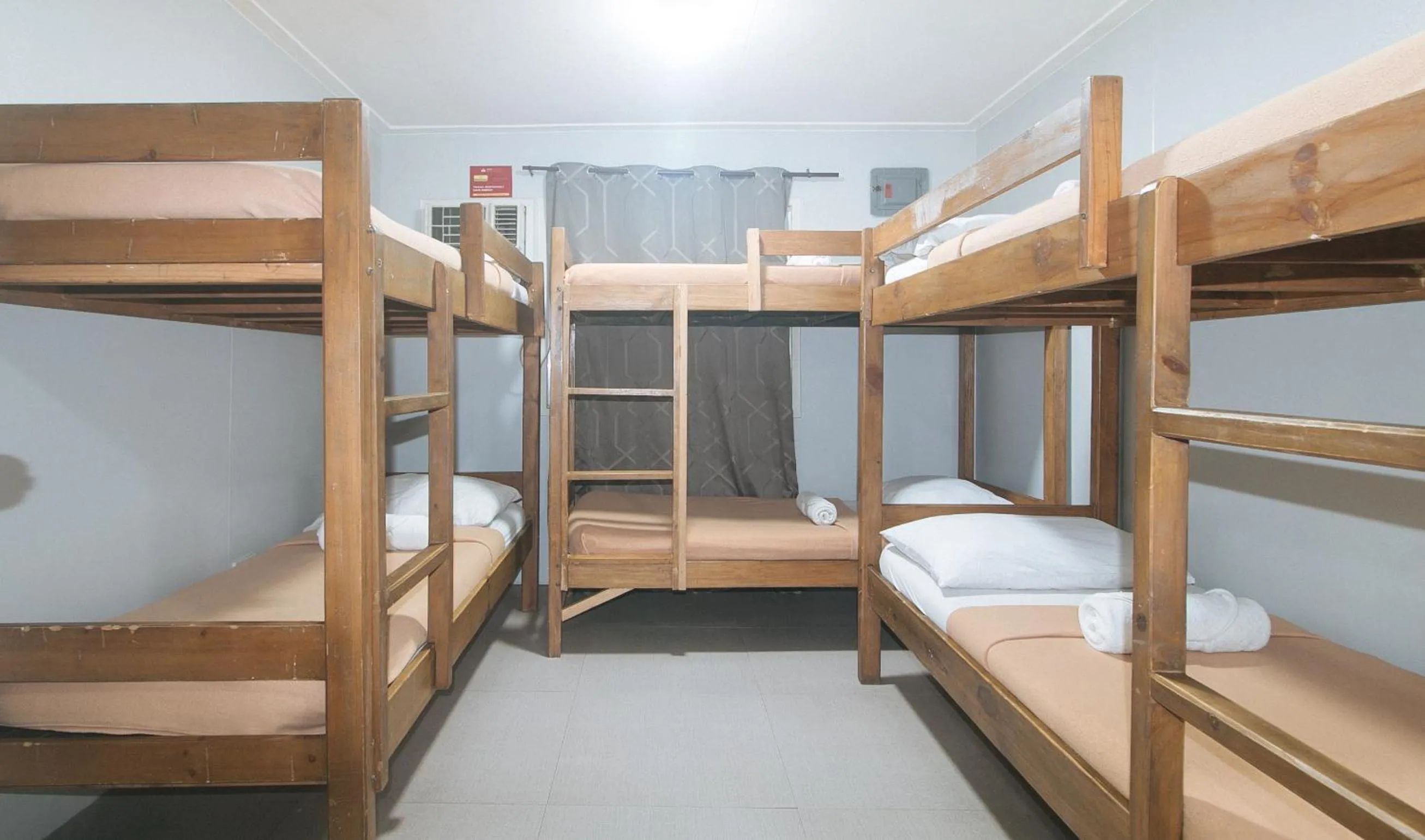 Bed in Metro Deluxe Residences near World Trade Center