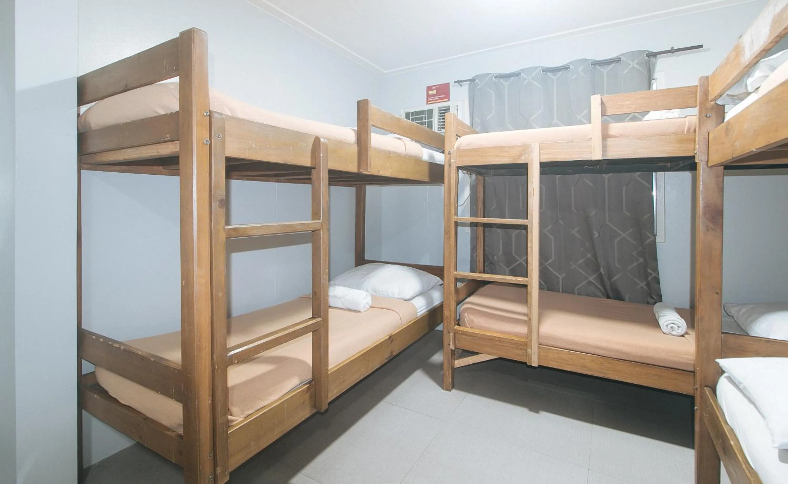 Bed in Metro Deluxe Residences near World Trade Center