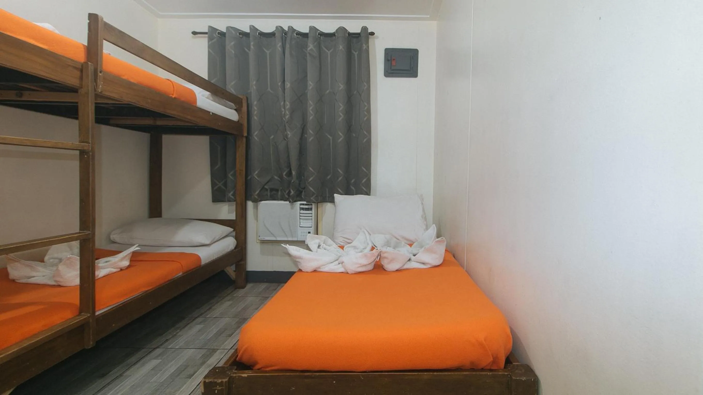 Bed in Metro Deluxe Residences near World Trade Center