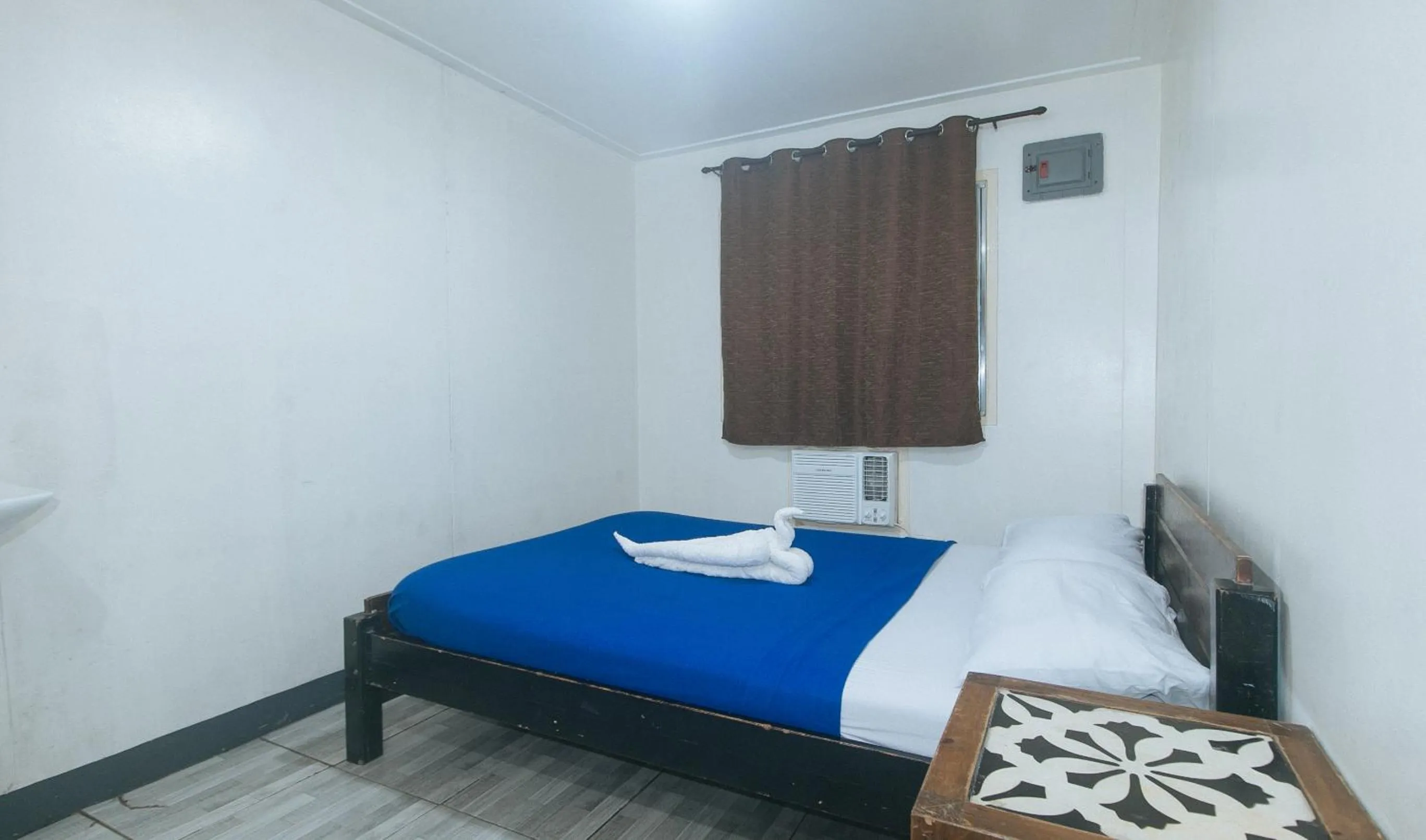 Bed in Metro Deluxe Residences near World Trade Center