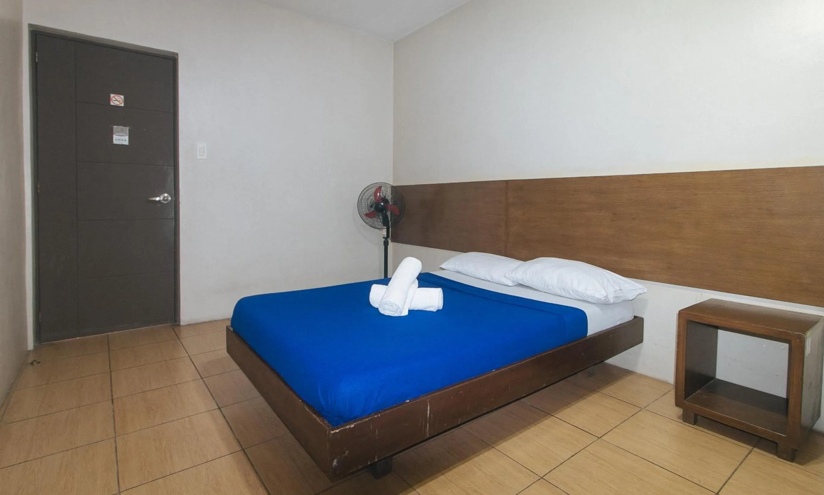 Bed in Metro Deluxe Residences near World Trade Center