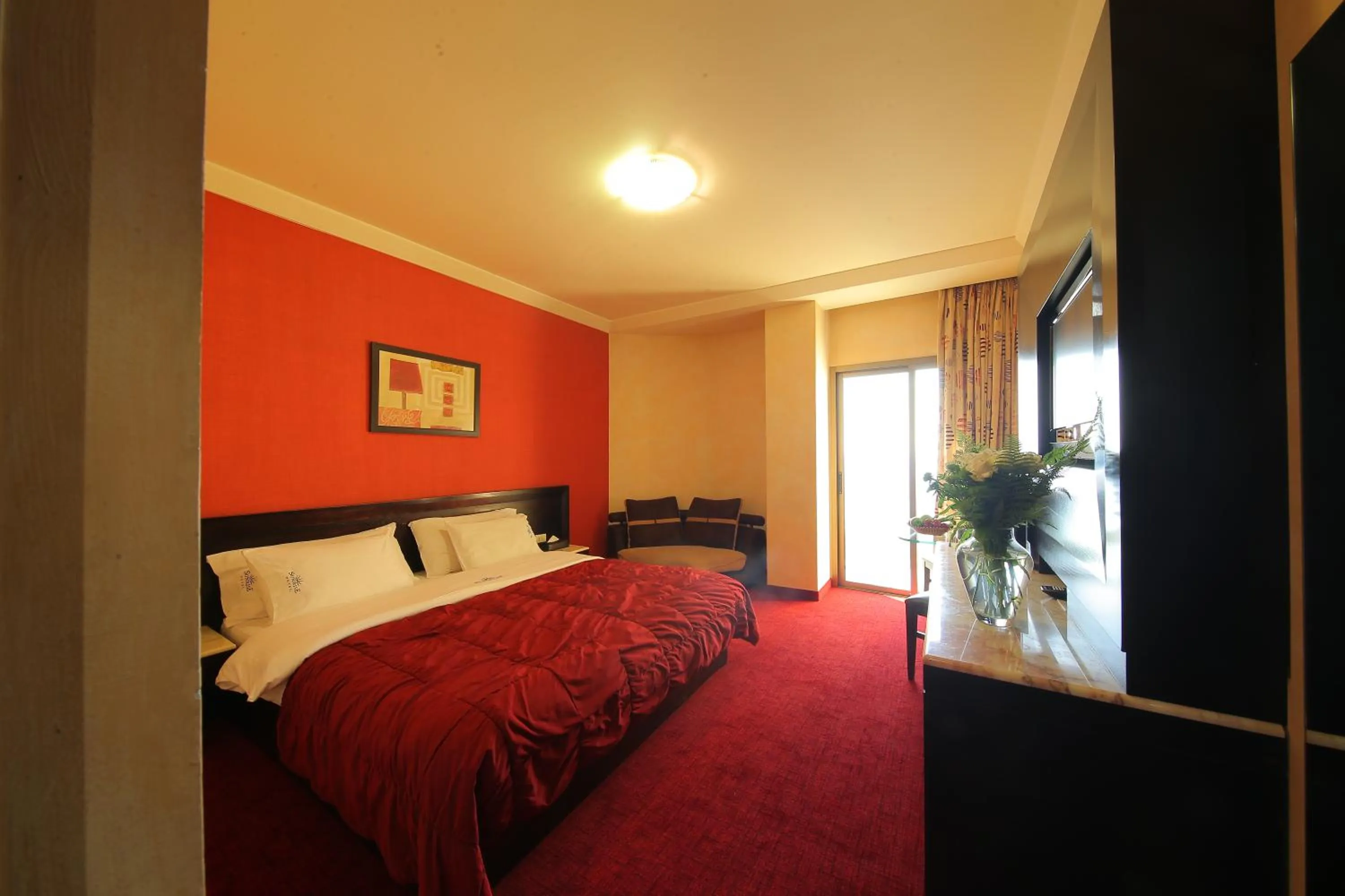 Bed in Sunrise Hotel