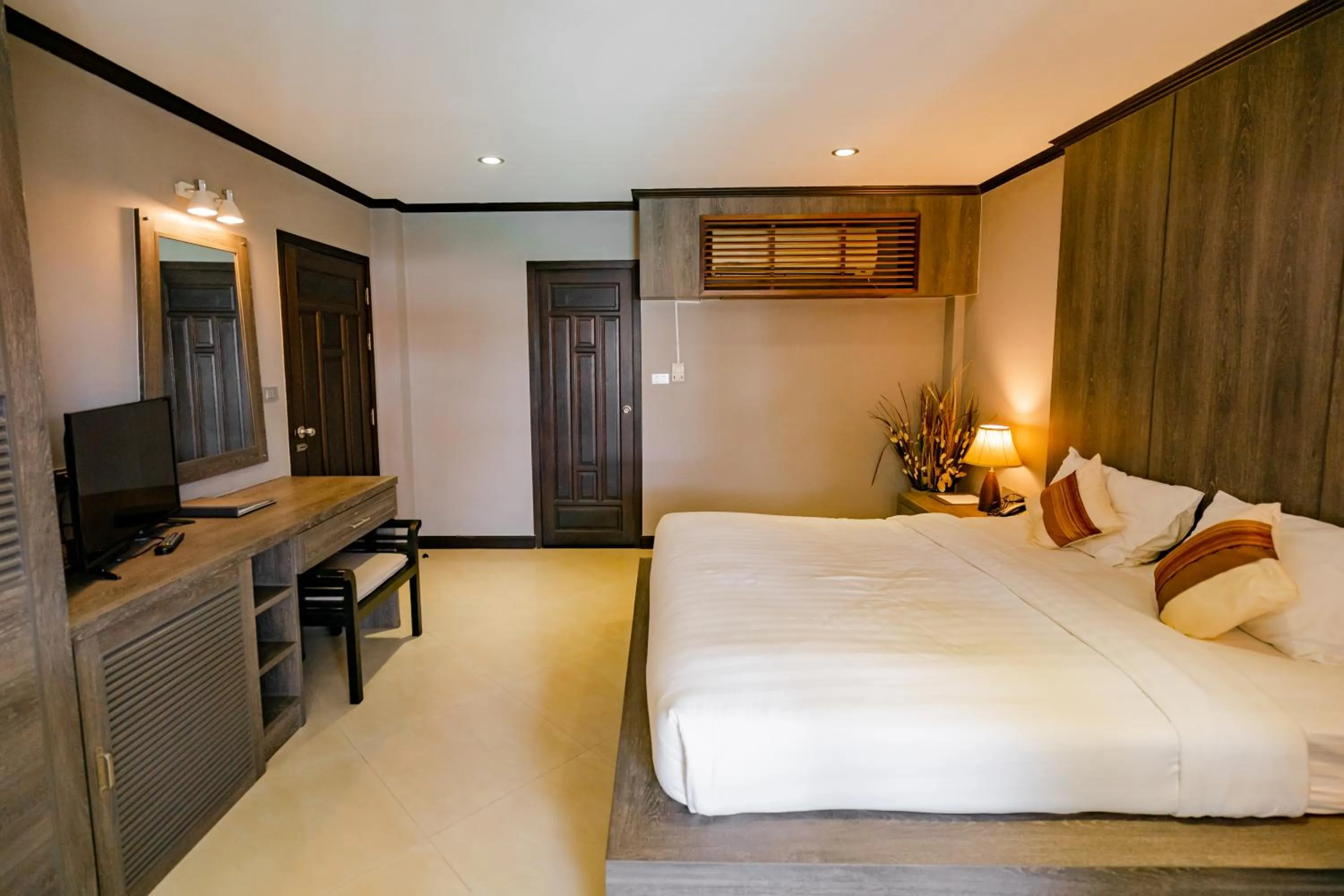 Bed in Naiya Buree Boutique Resort Nai Harn Beach
