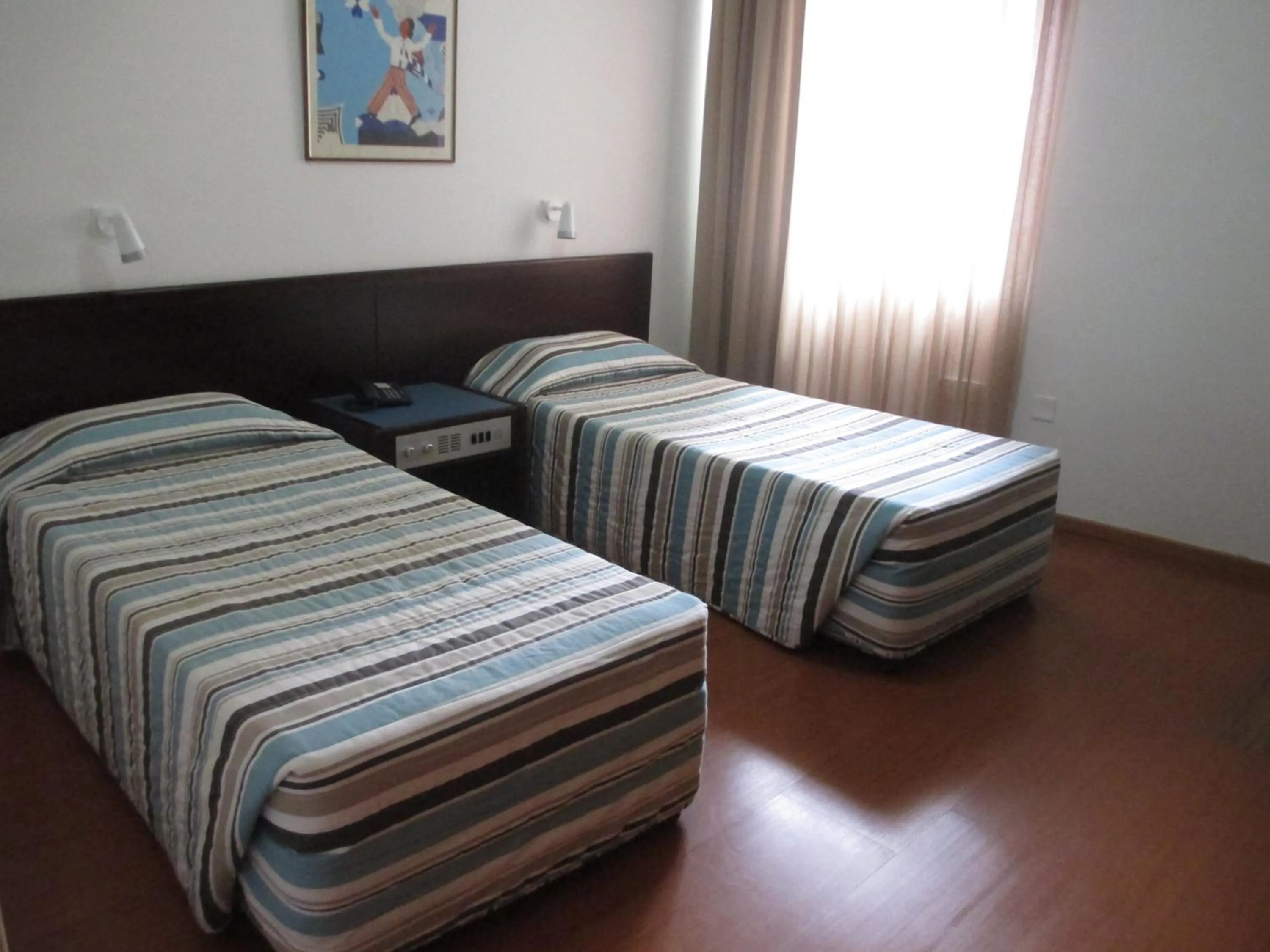 Bed in Atrium Zenon Hotel Apartments