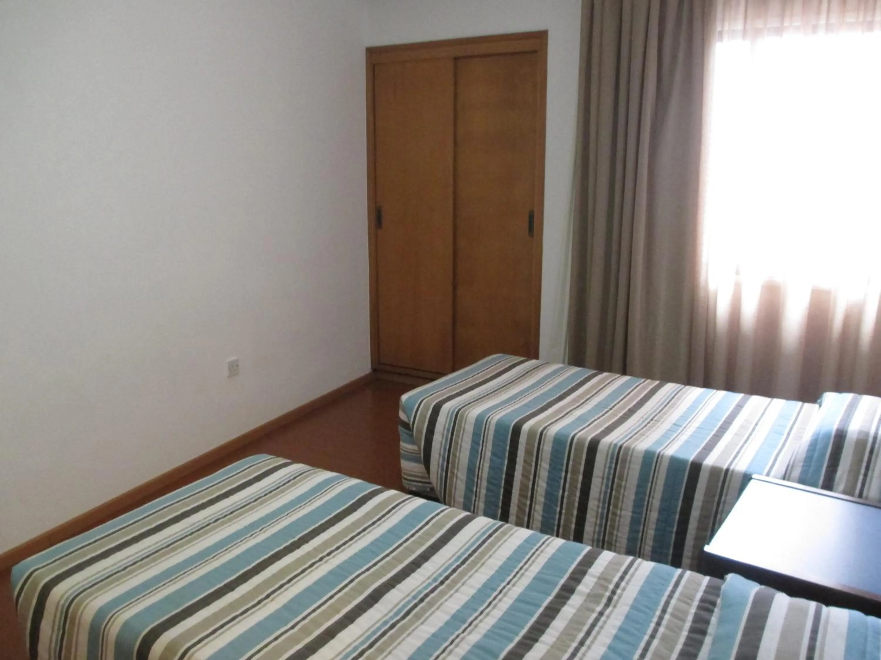 Bed in Atrium Zenon Hotel Apartments