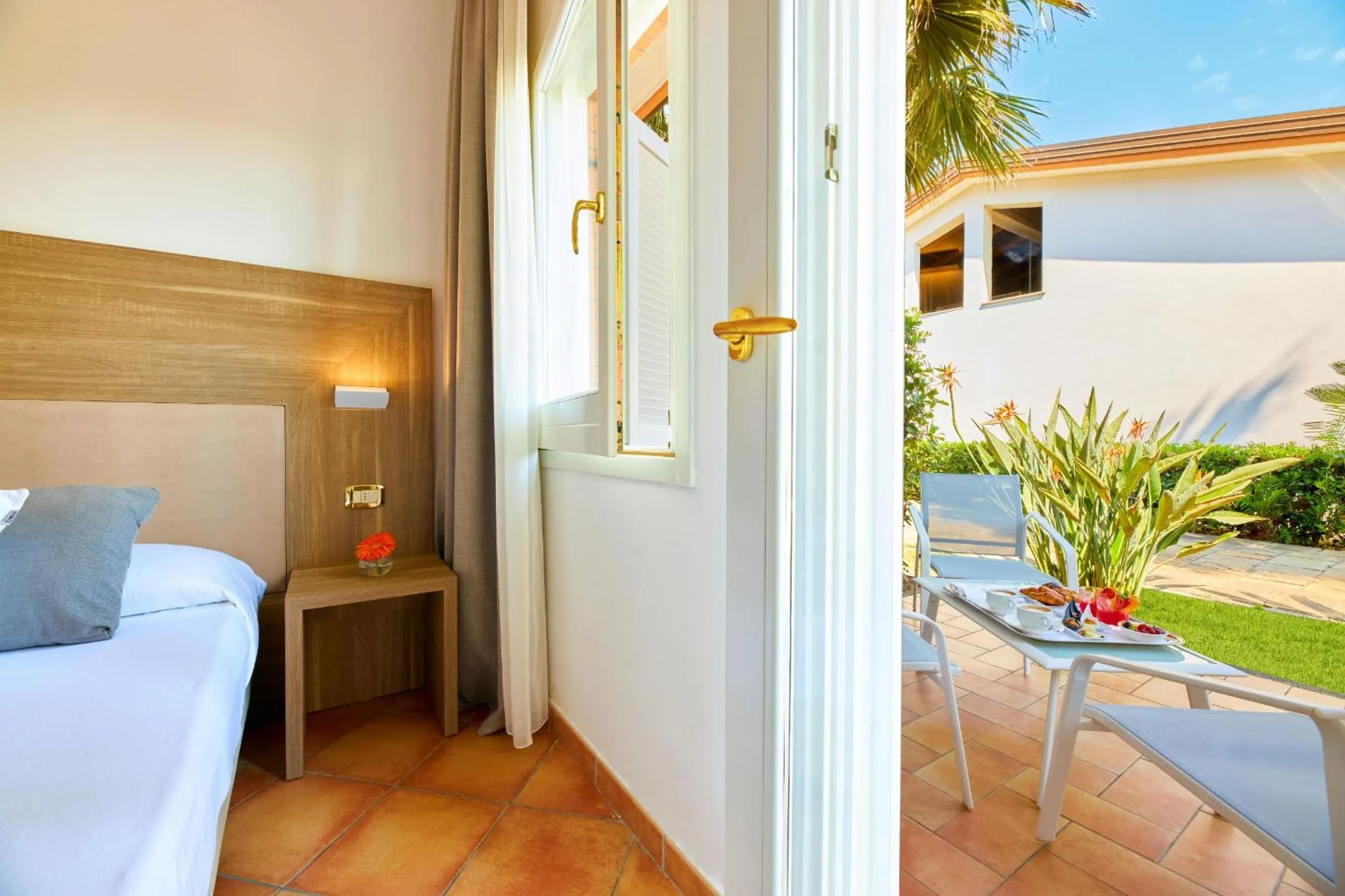 Patio, Bed in Paestum Inn Beach Resort