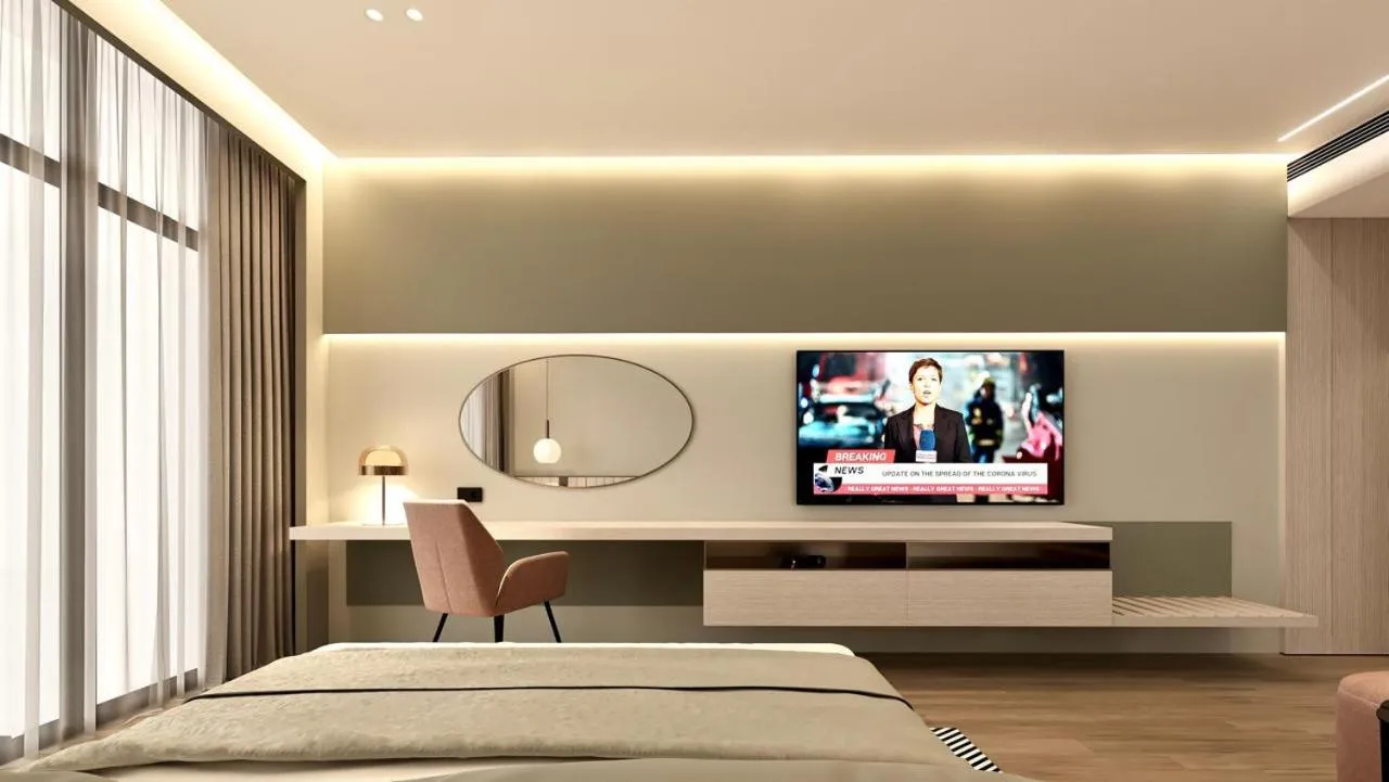 Bed in ParkTower Suites