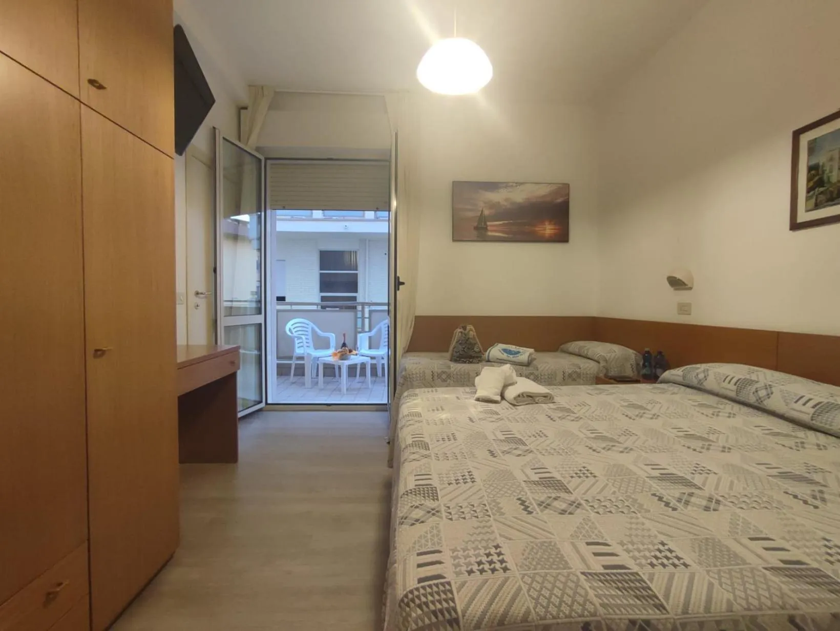 Bed in Hotel Losanna Cervia