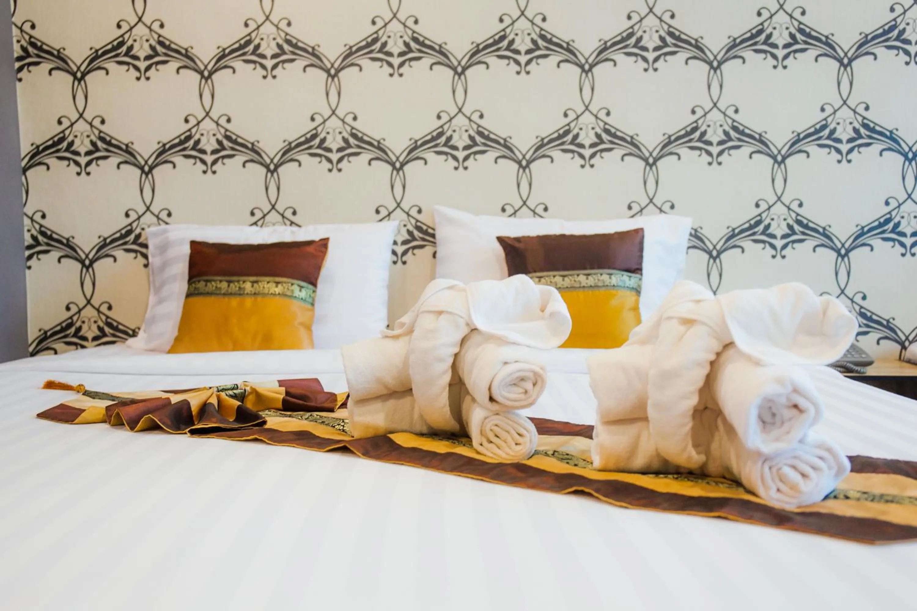 Photo of the whole room, Bed in Km Hotel Chiang Mai