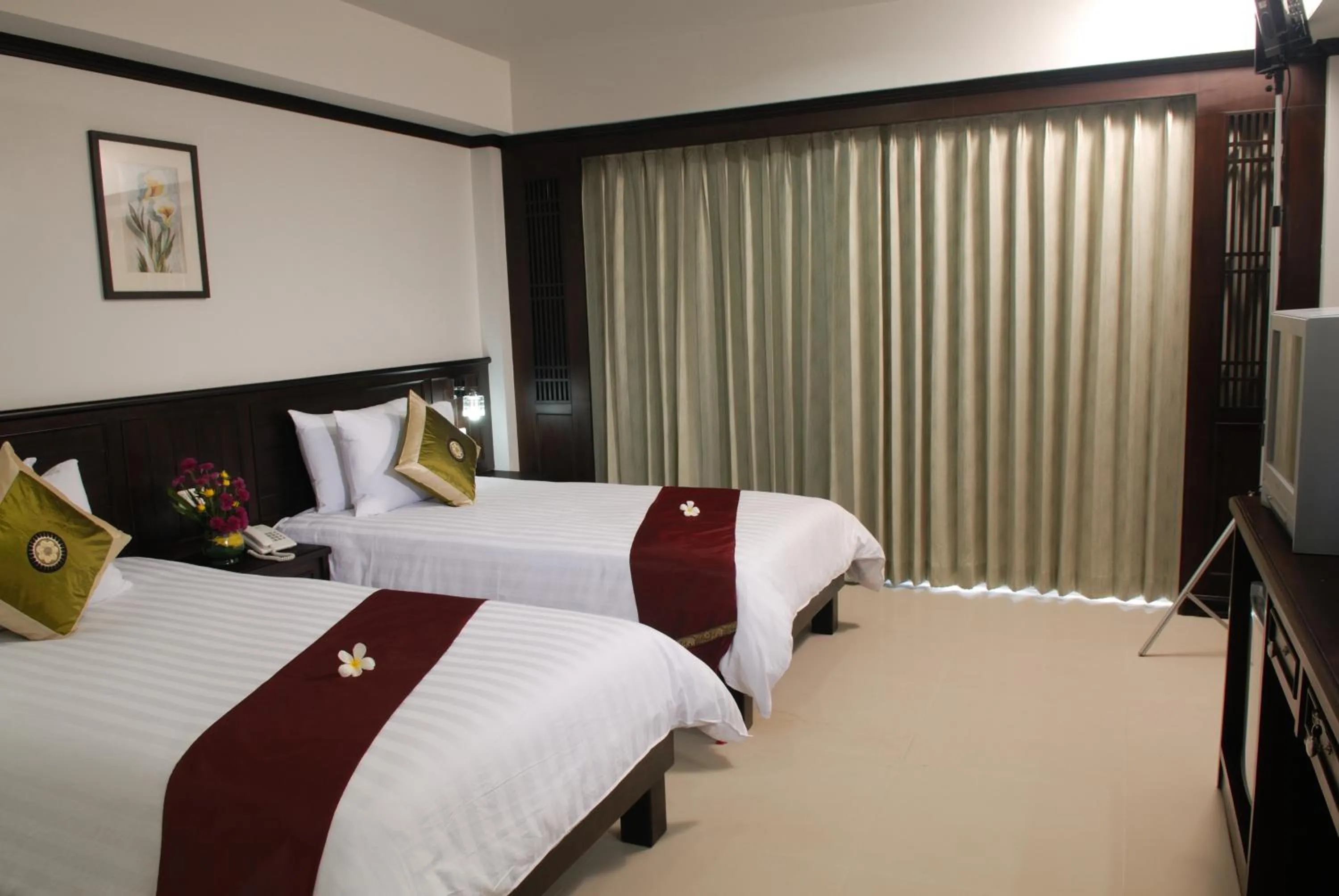 Bed in First Residence Hotel