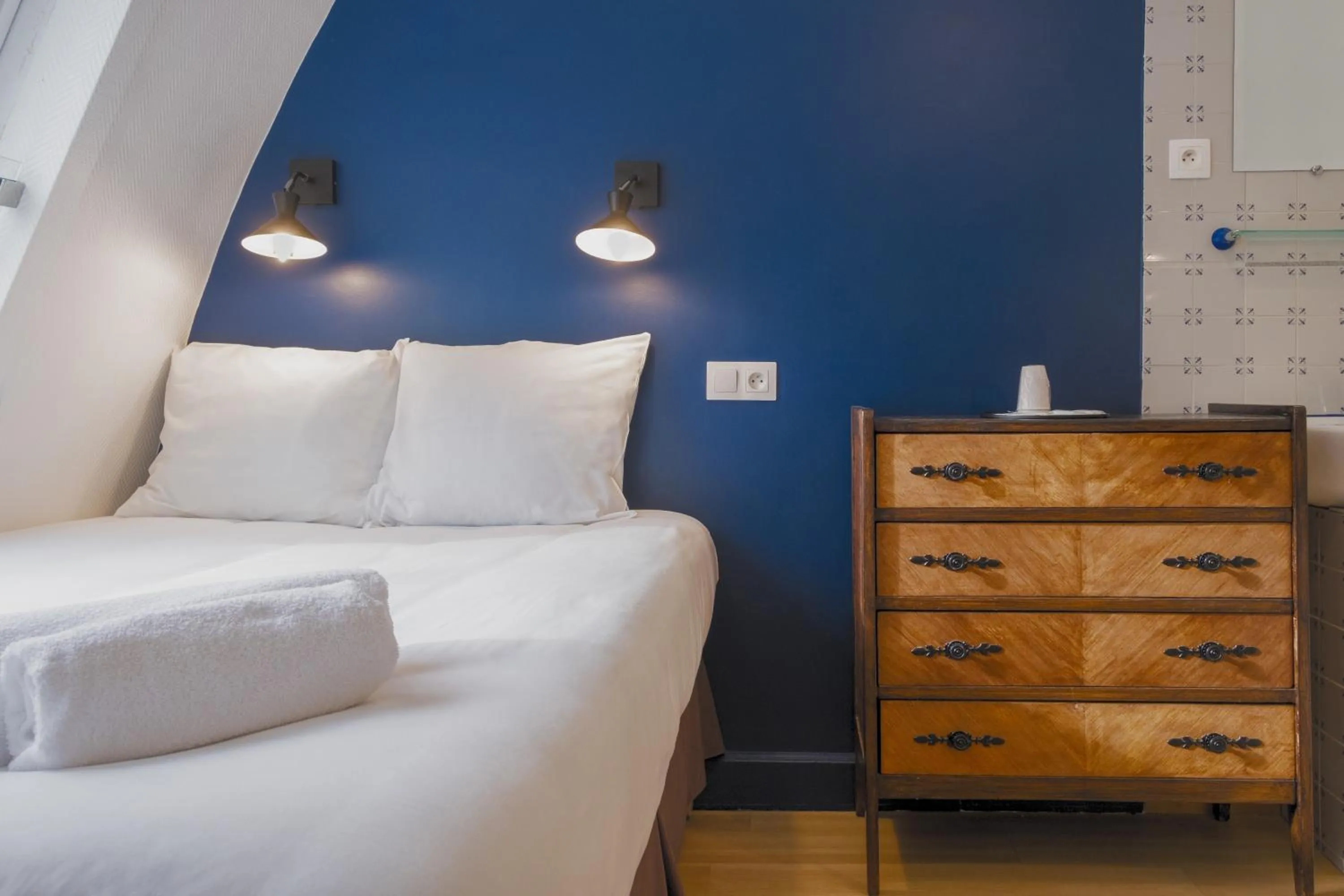 Bed in Hôtel Marignan