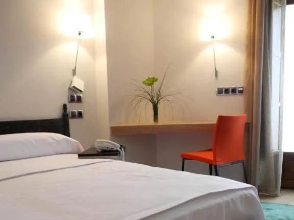 Photo of the whole room, Bed in Hospederia Chapitel