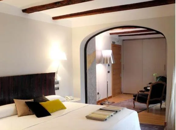 Photo of the whole room, Bed in Hospederia Chapitel