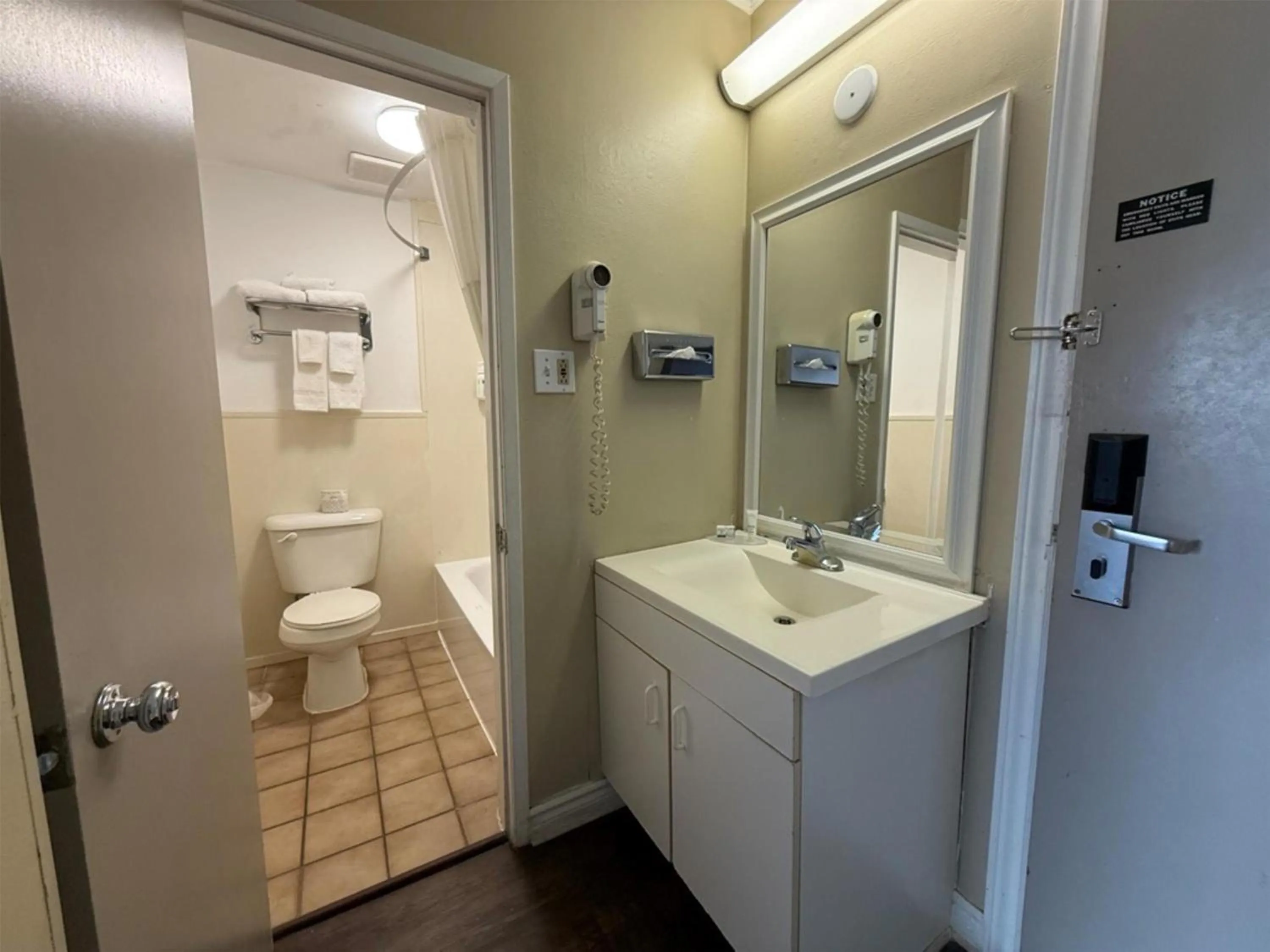 Shower in SureStay by Best Western Brockville