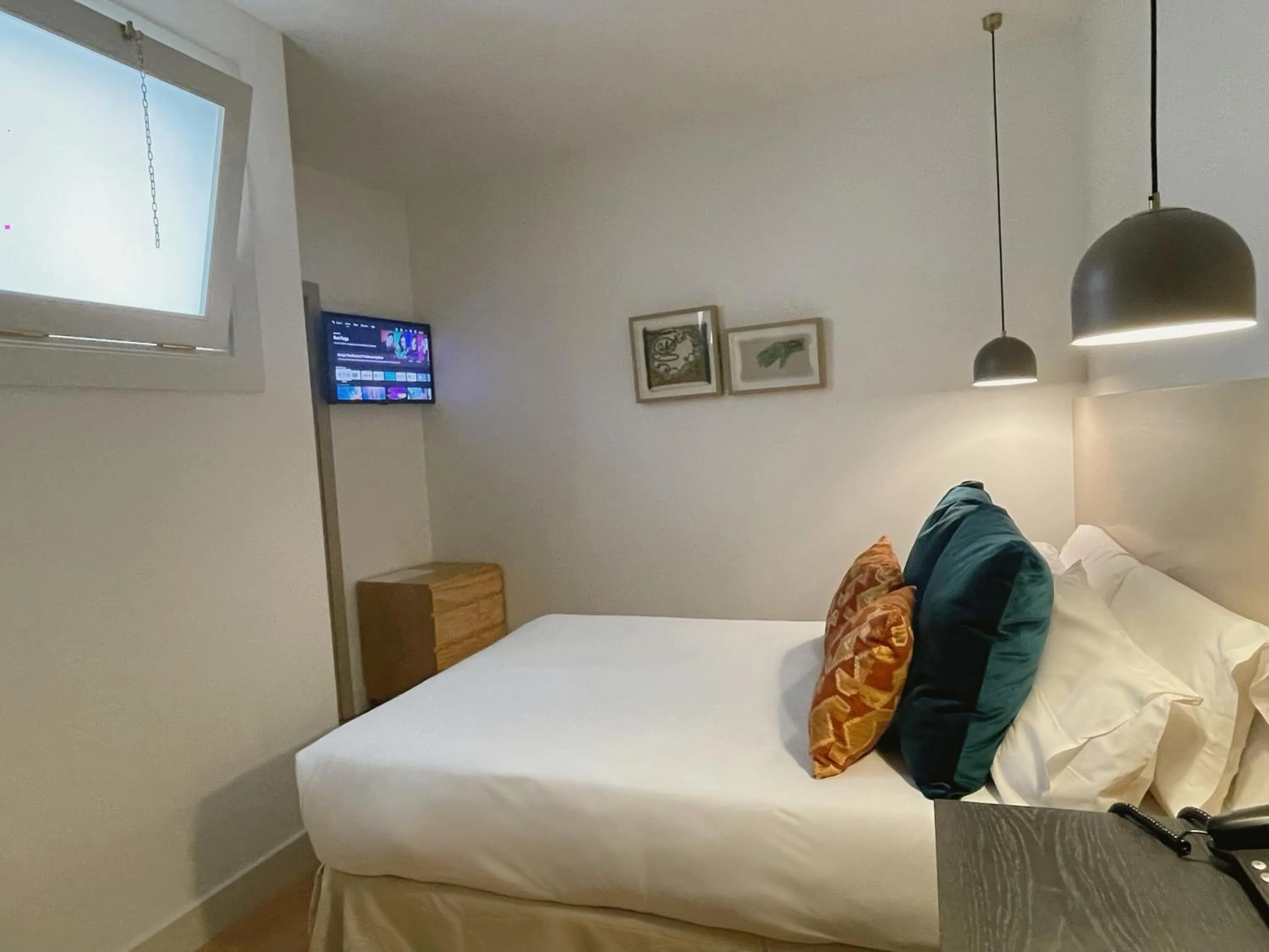 Bed in VEINTIUNO Emblematic Hotels - Adults Only