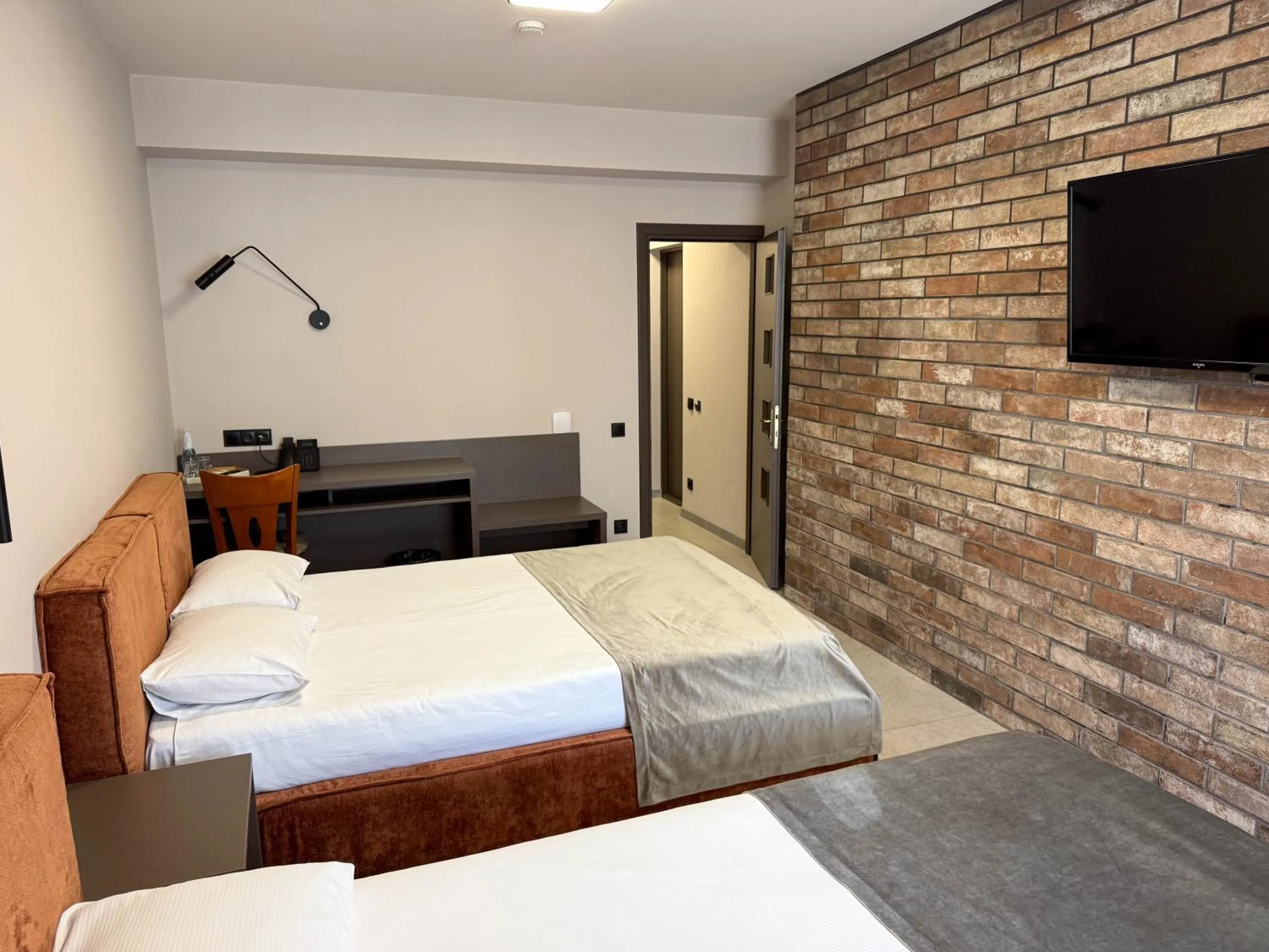 Photo of the whole room, Bed in Komilfo Hotel