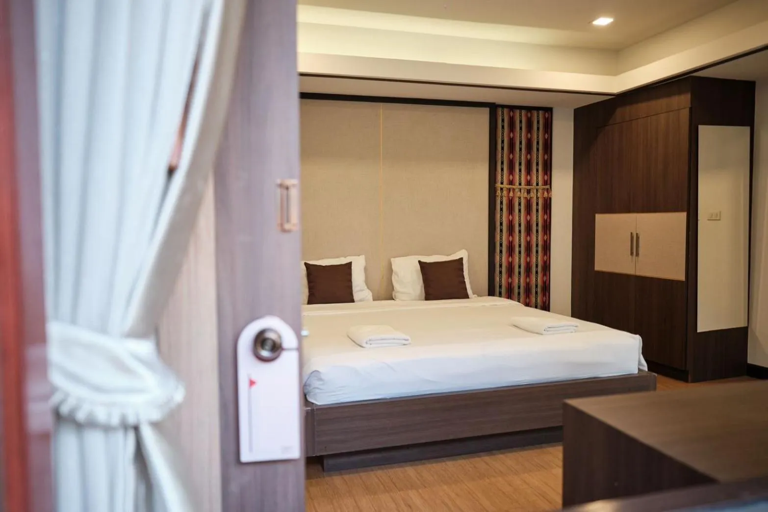 Bed in CHORLADA LANNA HOTEL