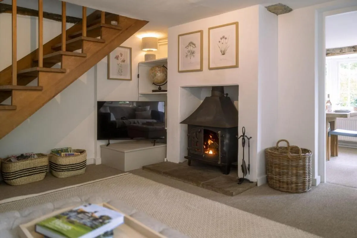 fireplace in Danny Lodge - Country Cottage Near Brighton by Huluki Sussex Stays