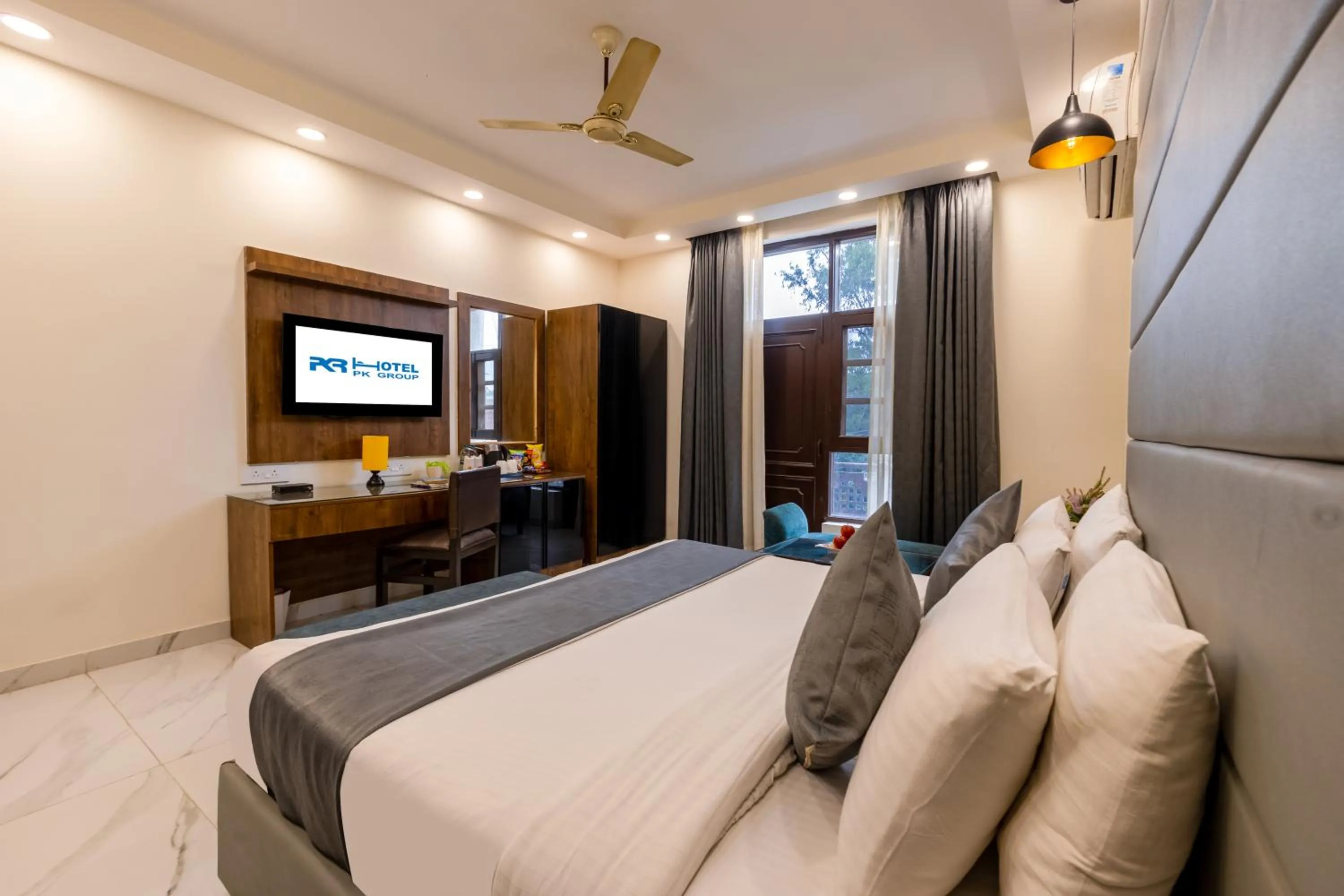 Bed in Hotel PK Residency Sector 18 Noida
