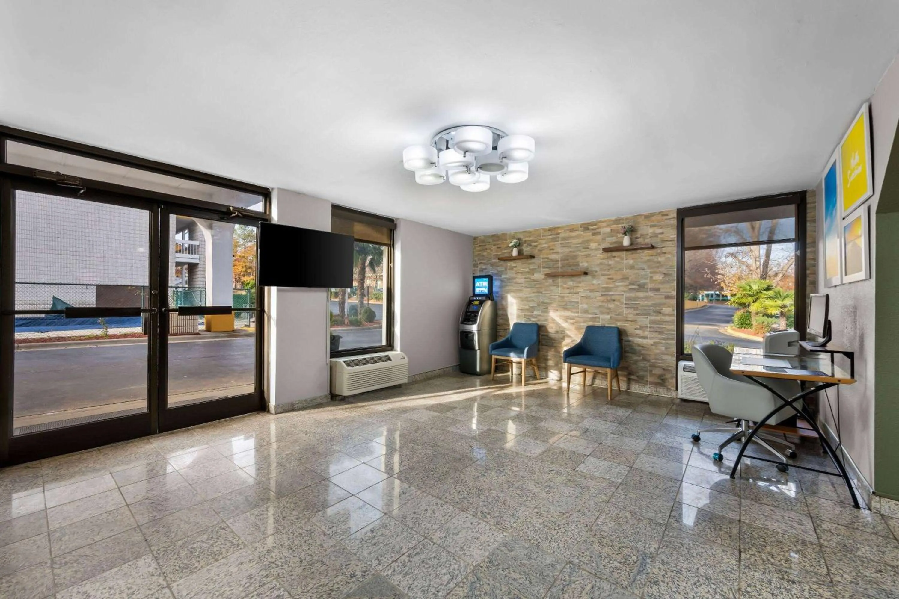 Lobby or reception in Days Inn by Wyndham Raleigh Midtown