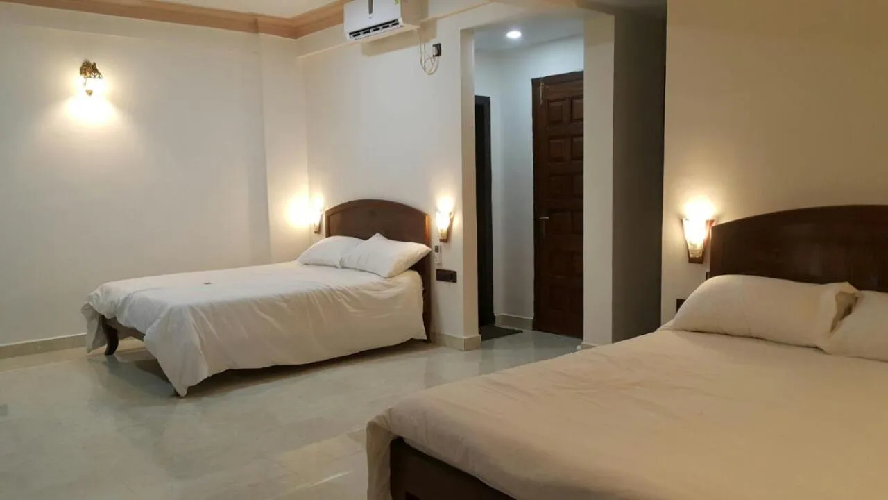 Bed in Hotel Murud Marina