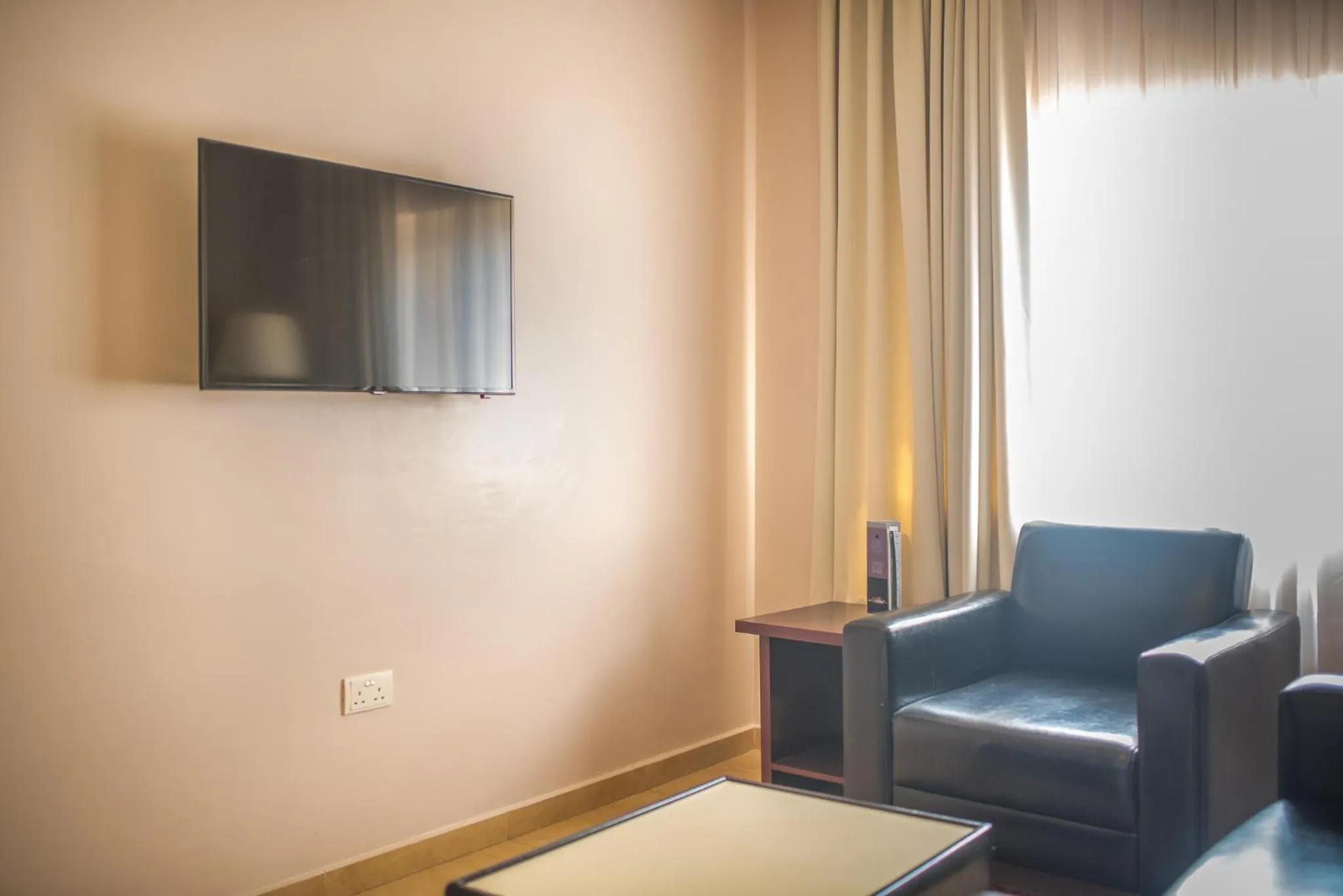 Living room in Ace Premier Hotel