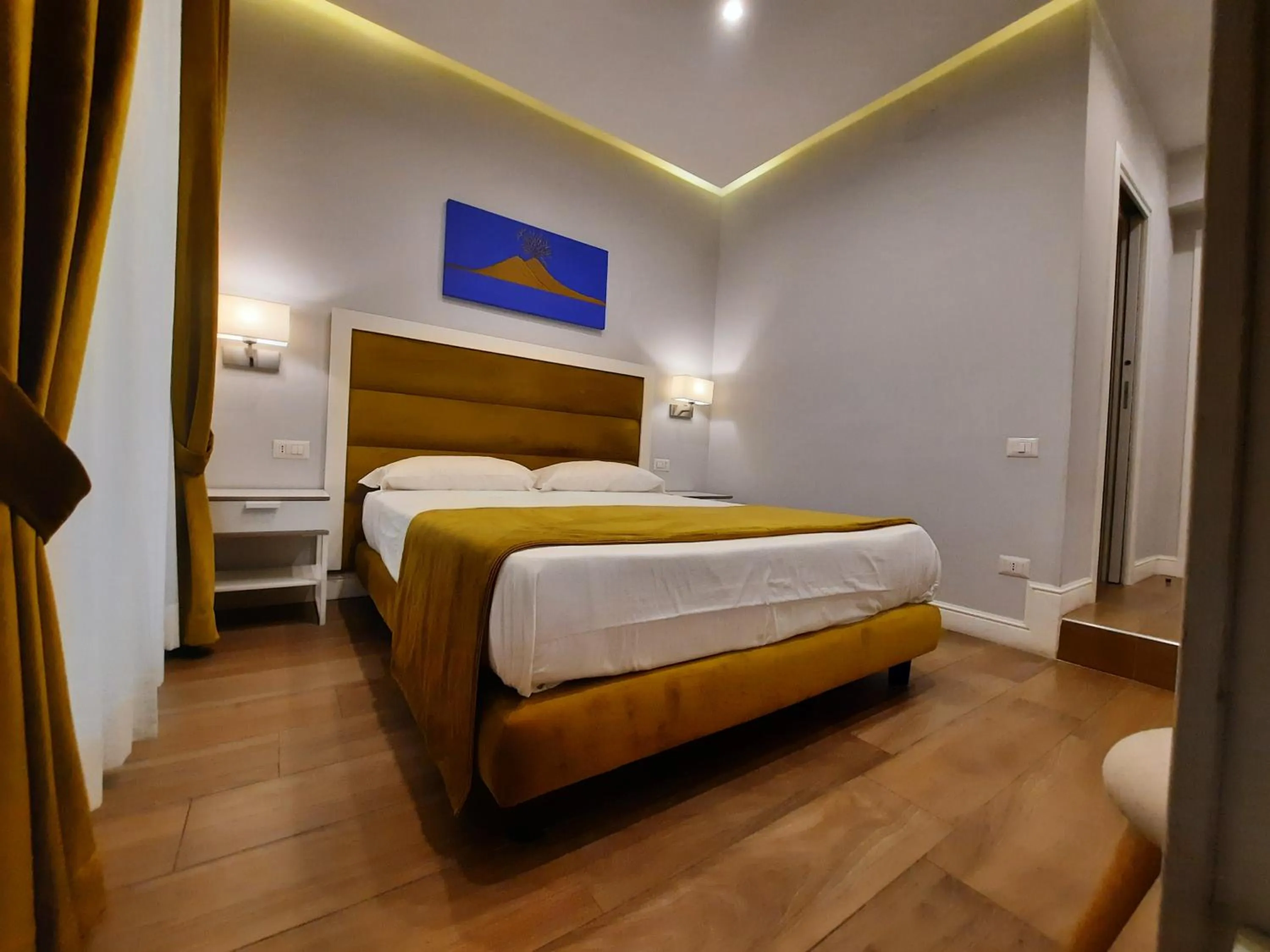 Photo of the whole room, Bed in Gea suite