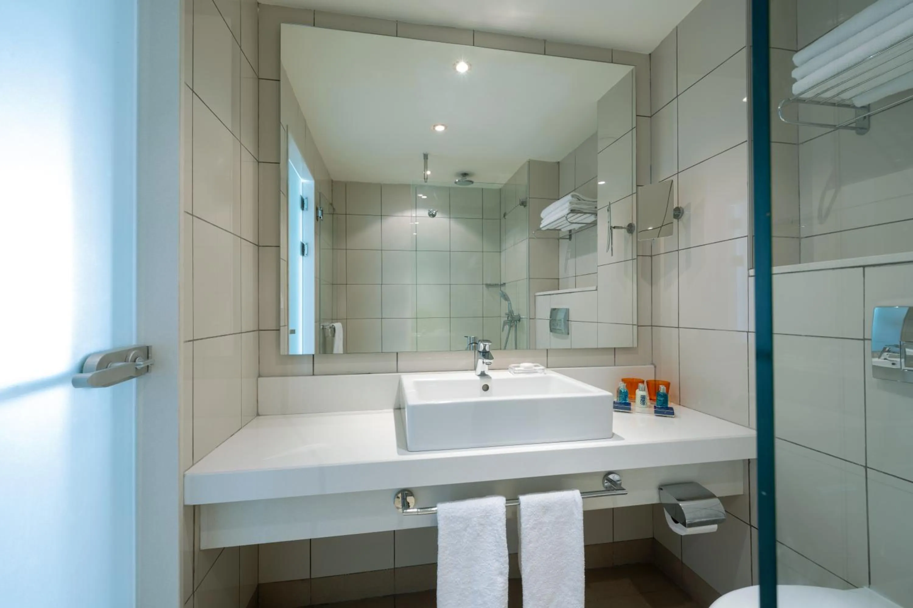 Bathroom in Noga by Isrotel Collection