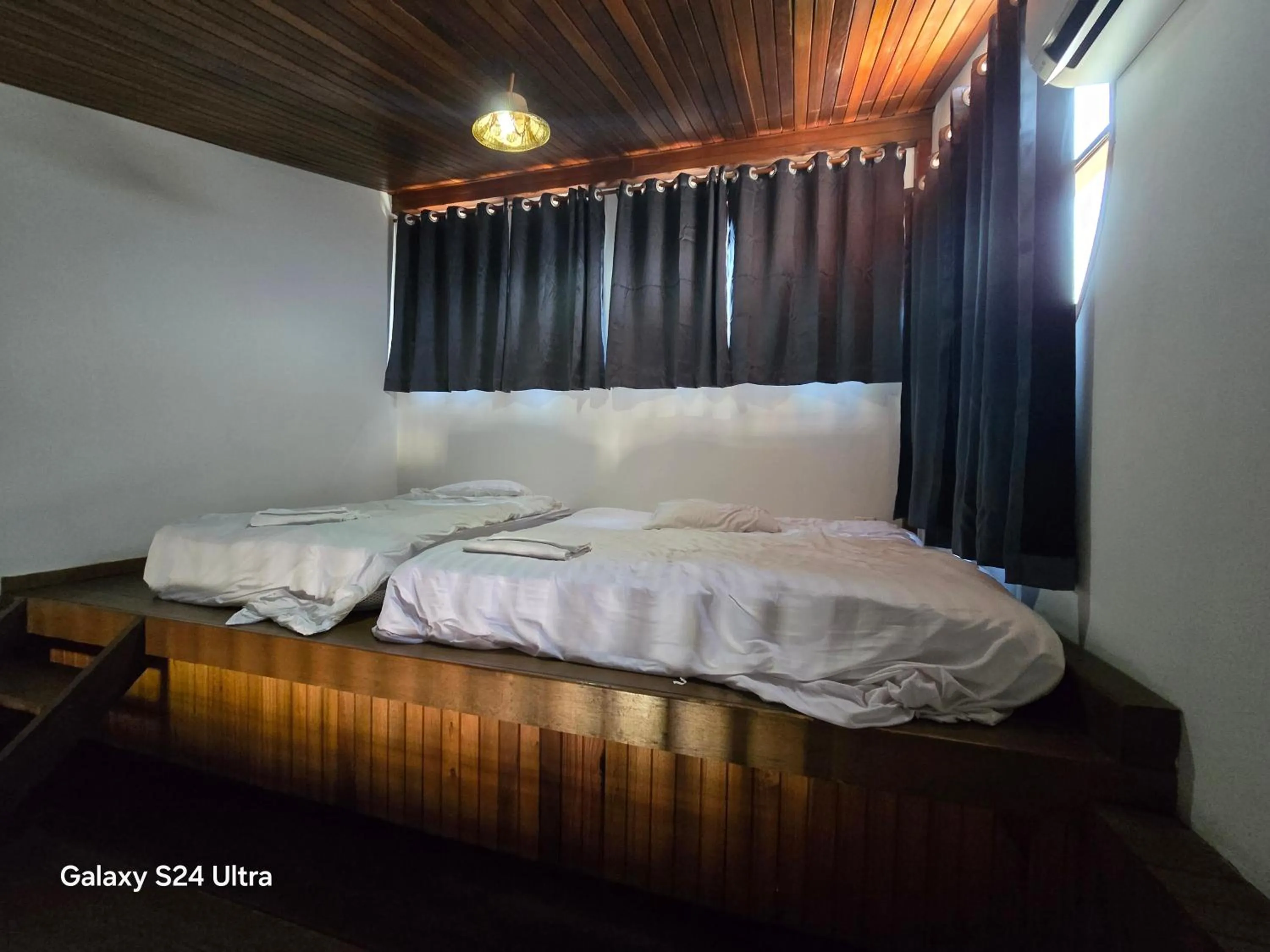 Living room, Bed in Sasitara Residence