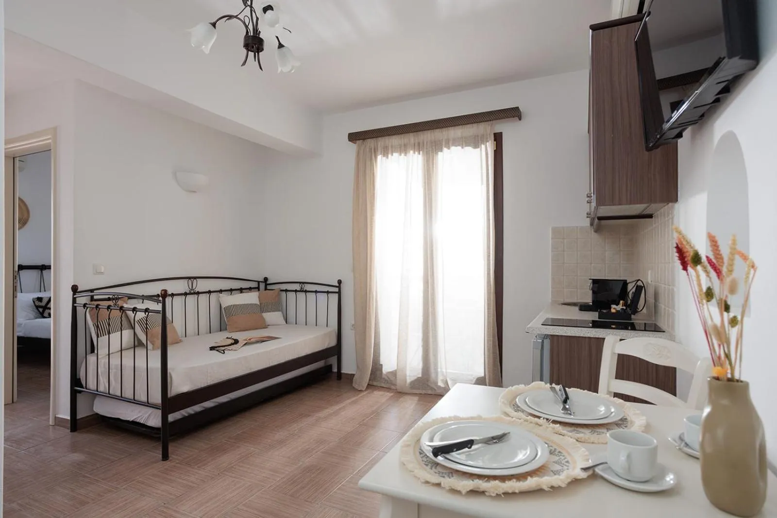 Bed in Anemomilos Beach hotel