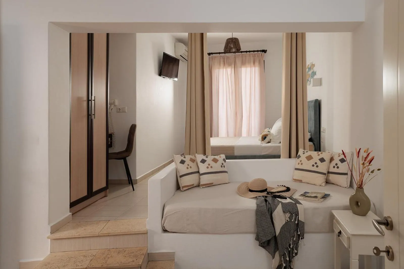 Living room, Bed in Anemomilos Beach hotel