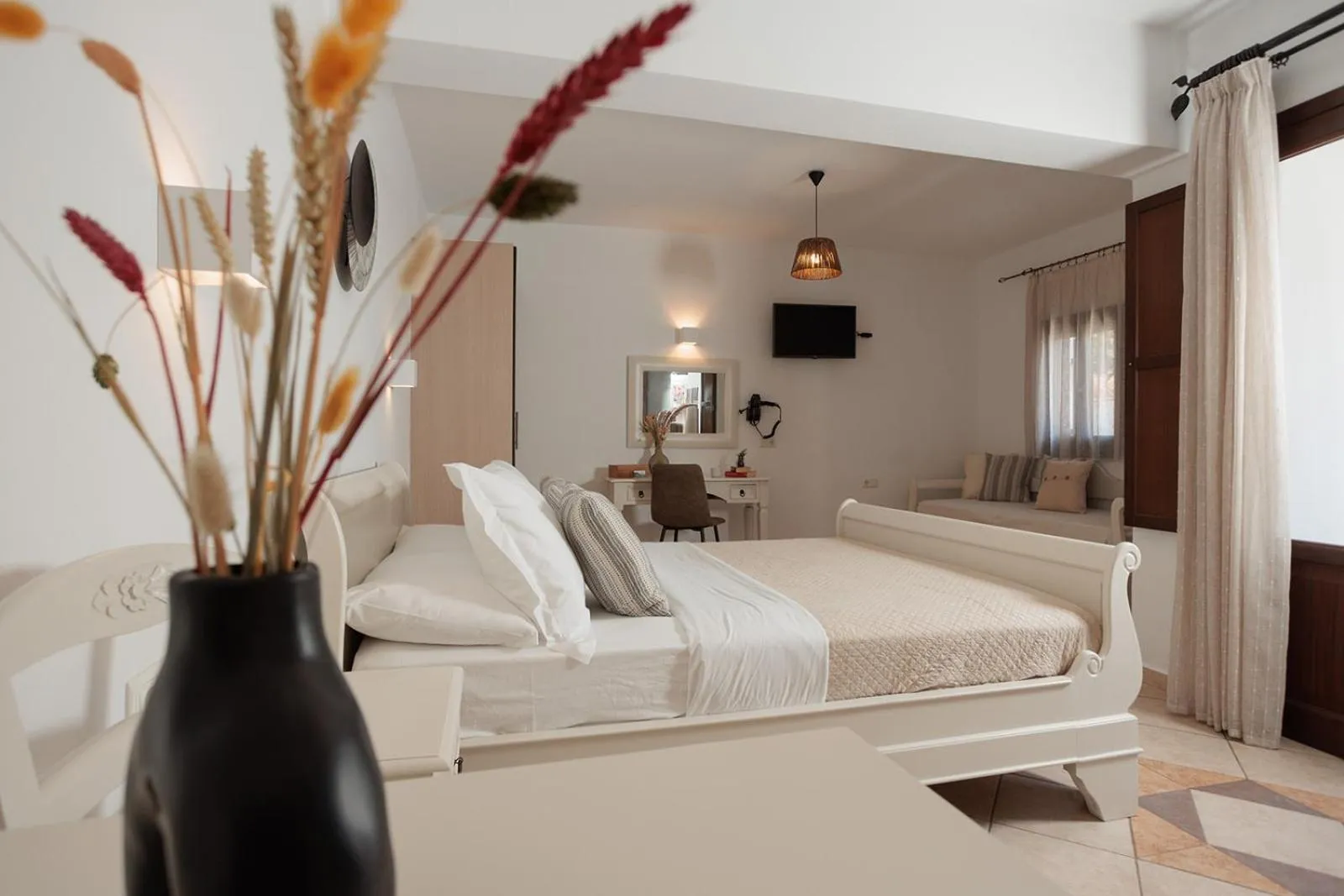 Bed in Anemomilos Beach hotel