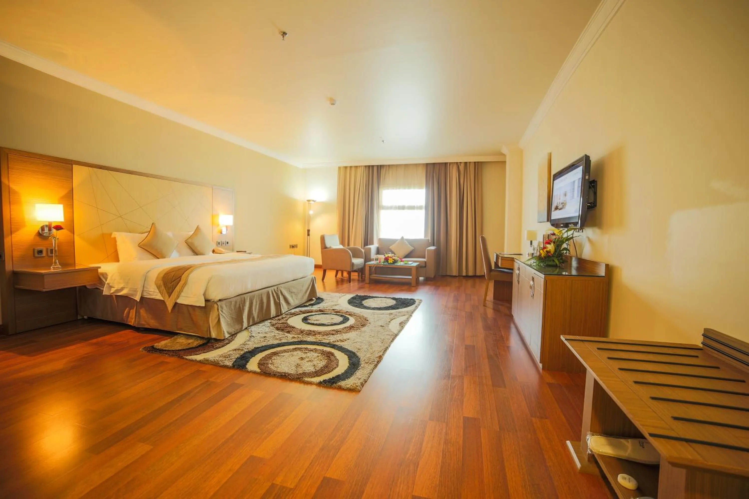 Photo of the whole room, Bed in Golden Tulip Hotel Buraidah Al Qassim