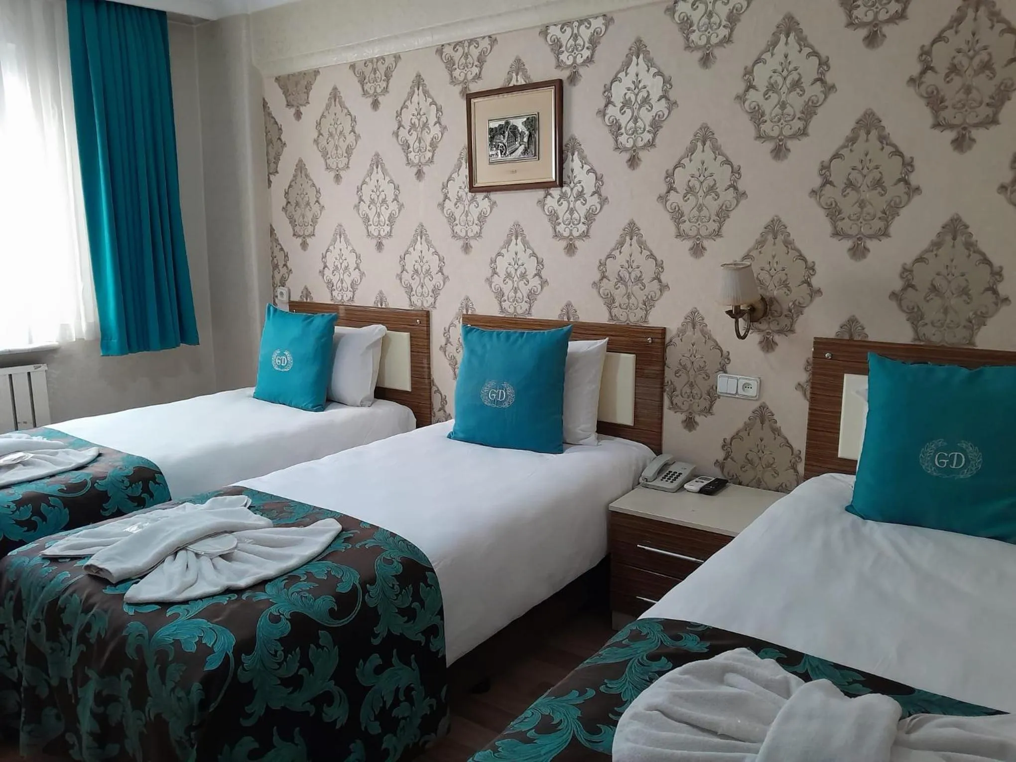 Bed in Grand Dilara Hotel