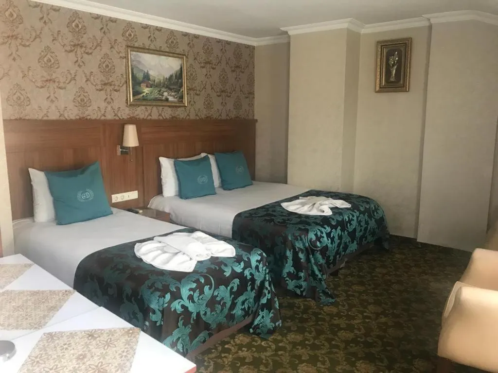 Bed in Grand Dilara Hotel