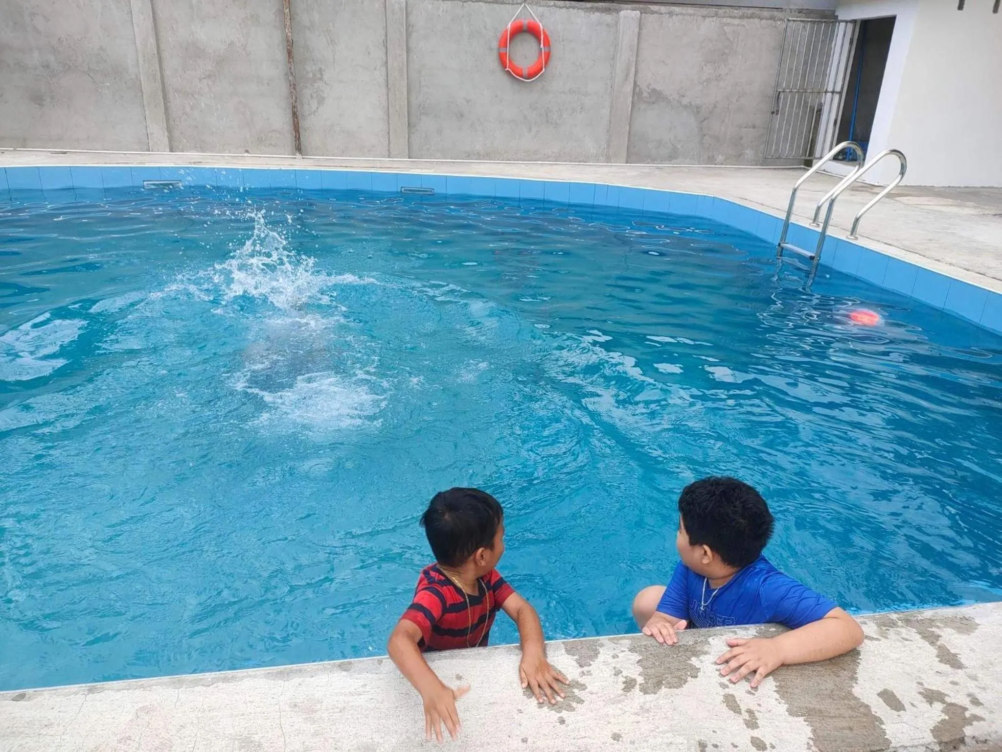 Swimming pool in Seaside traveler's Inn by Camiguin Island Home