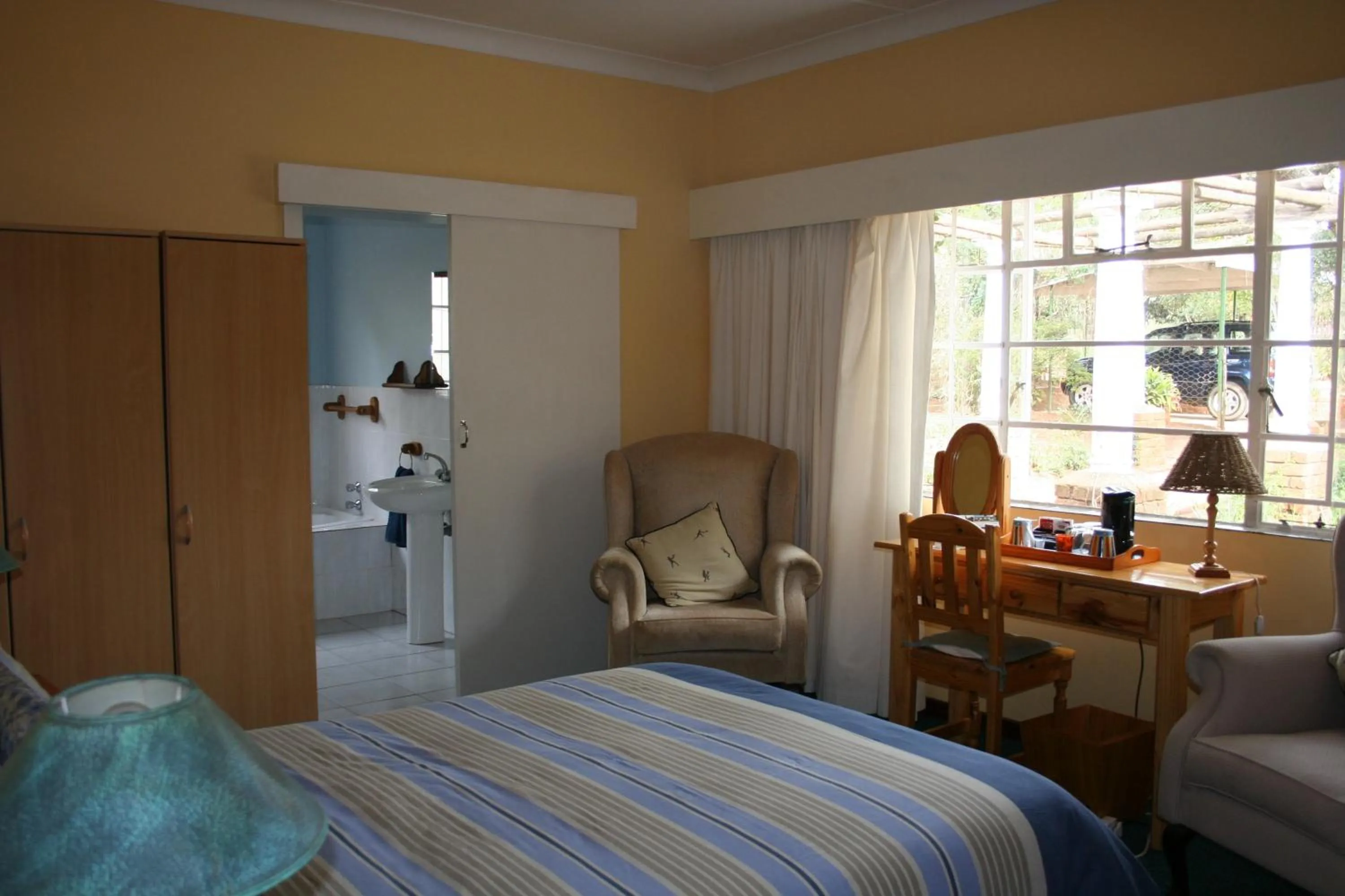 Photo of the whole room, Bed in The Manderson Hotel and Conference Centre