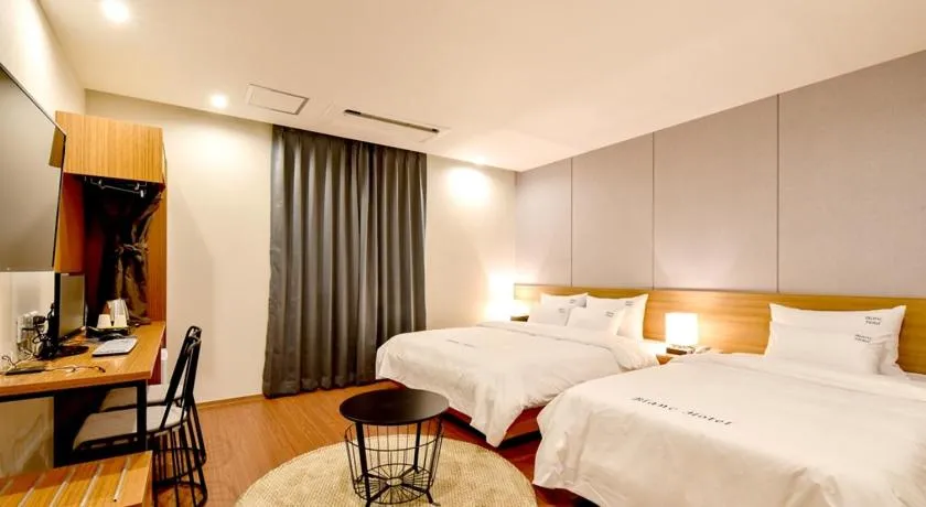 Bed in Blanc Business Hotel