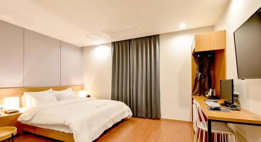 Bed in Blanc Business Hotel