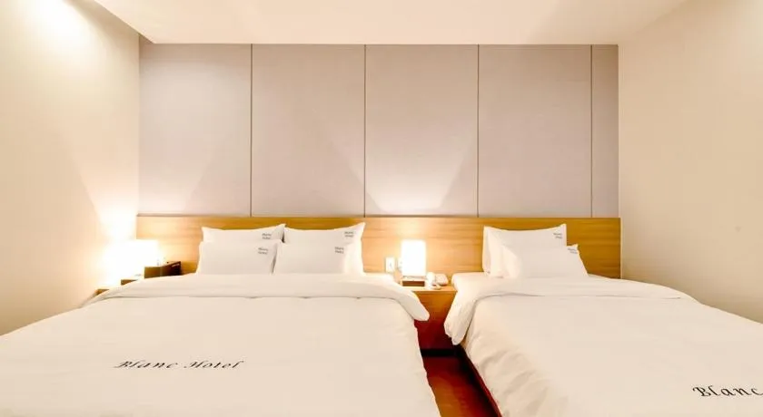 Bed in Blanc Business Hotel
