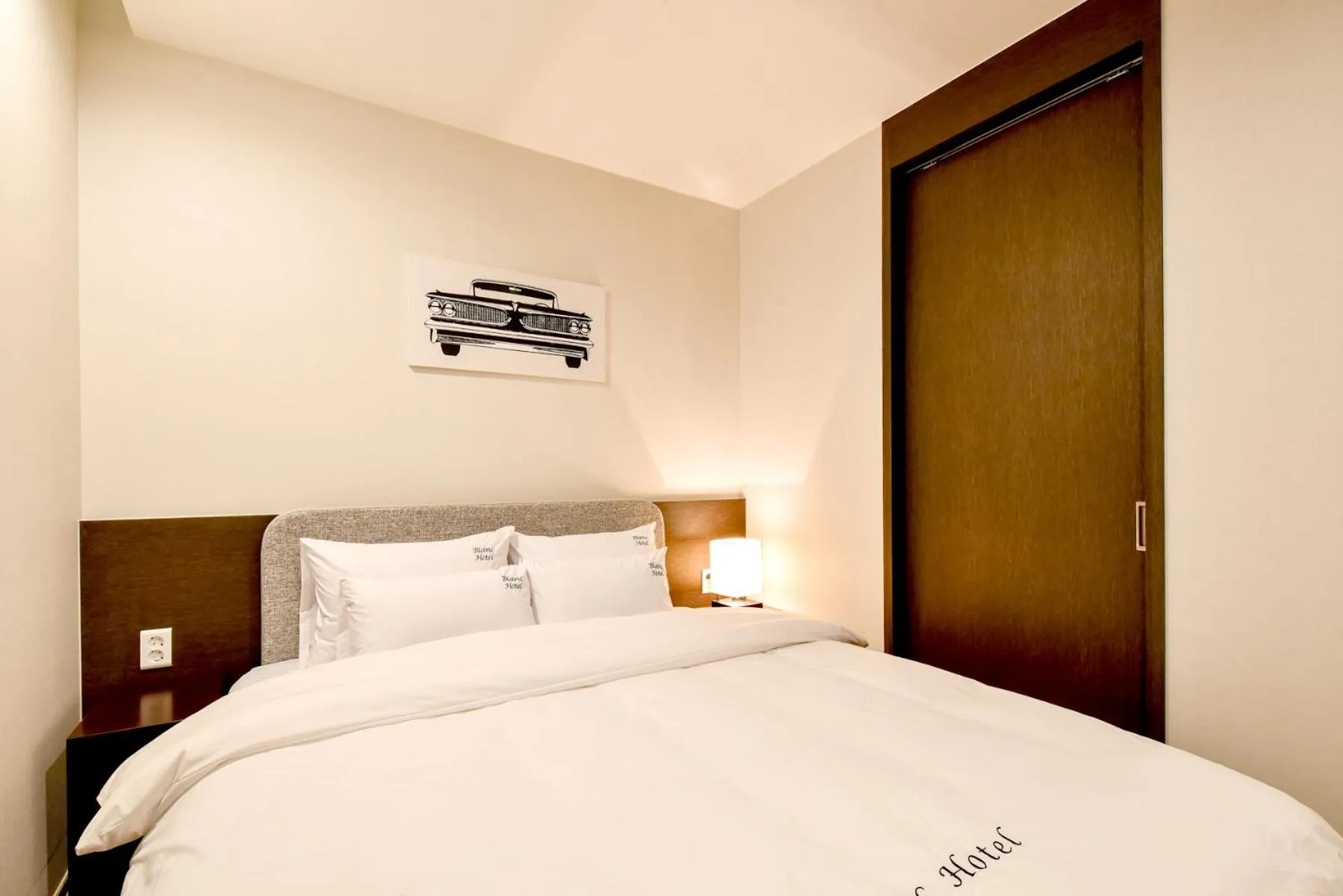 Bed in Blanc Business Hotel