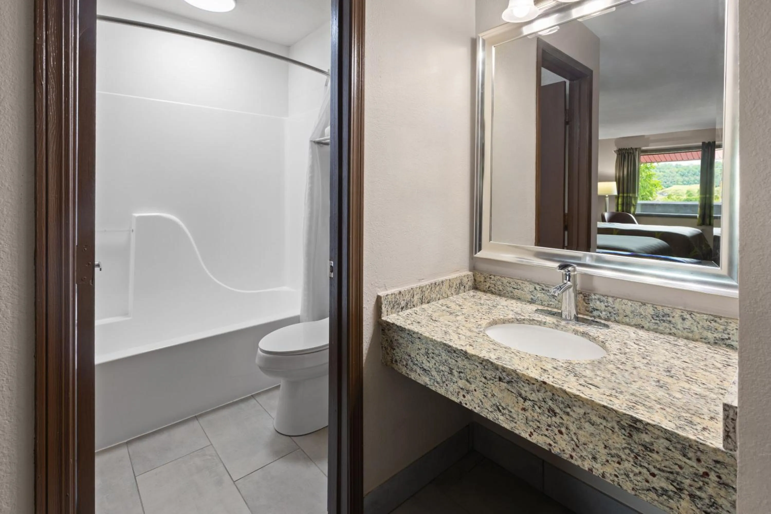 Bathroom in Super 8 by Wyndham Bridgeport/Clarksburg Area