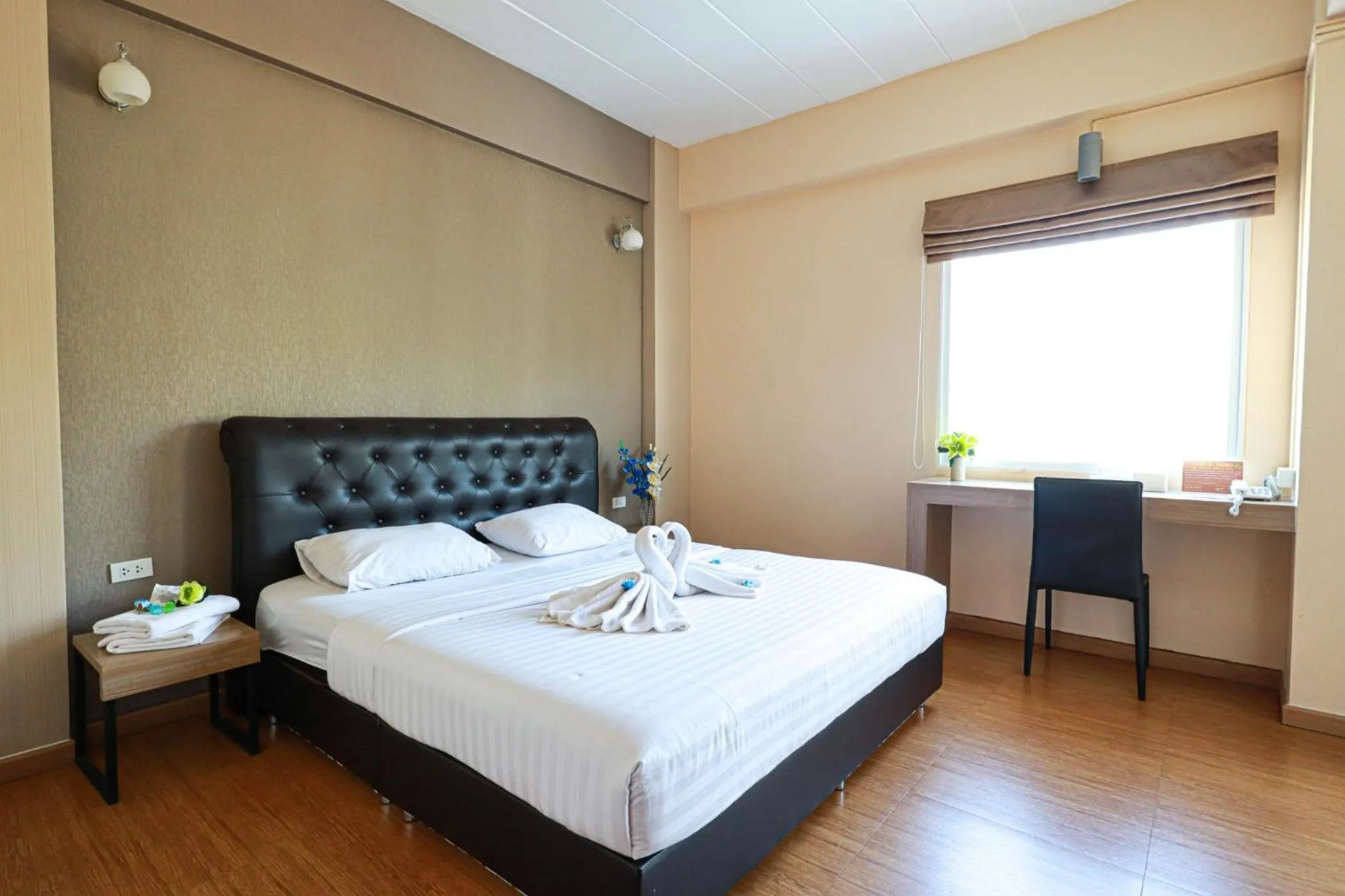 Photo of the whole room, Bed in Triple Trees Hotel