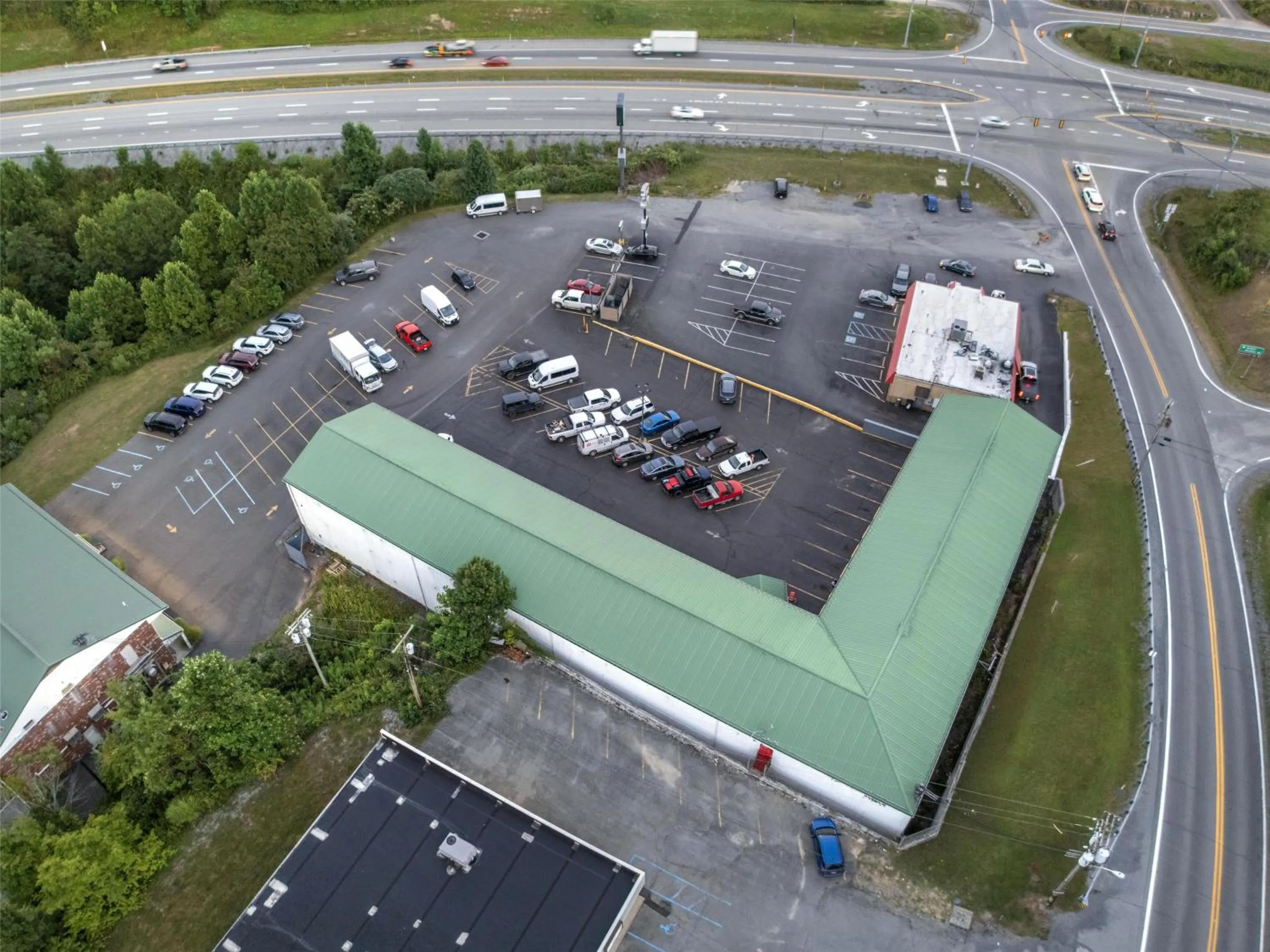 Property building in SureStay Hotel by Best Western Summersville