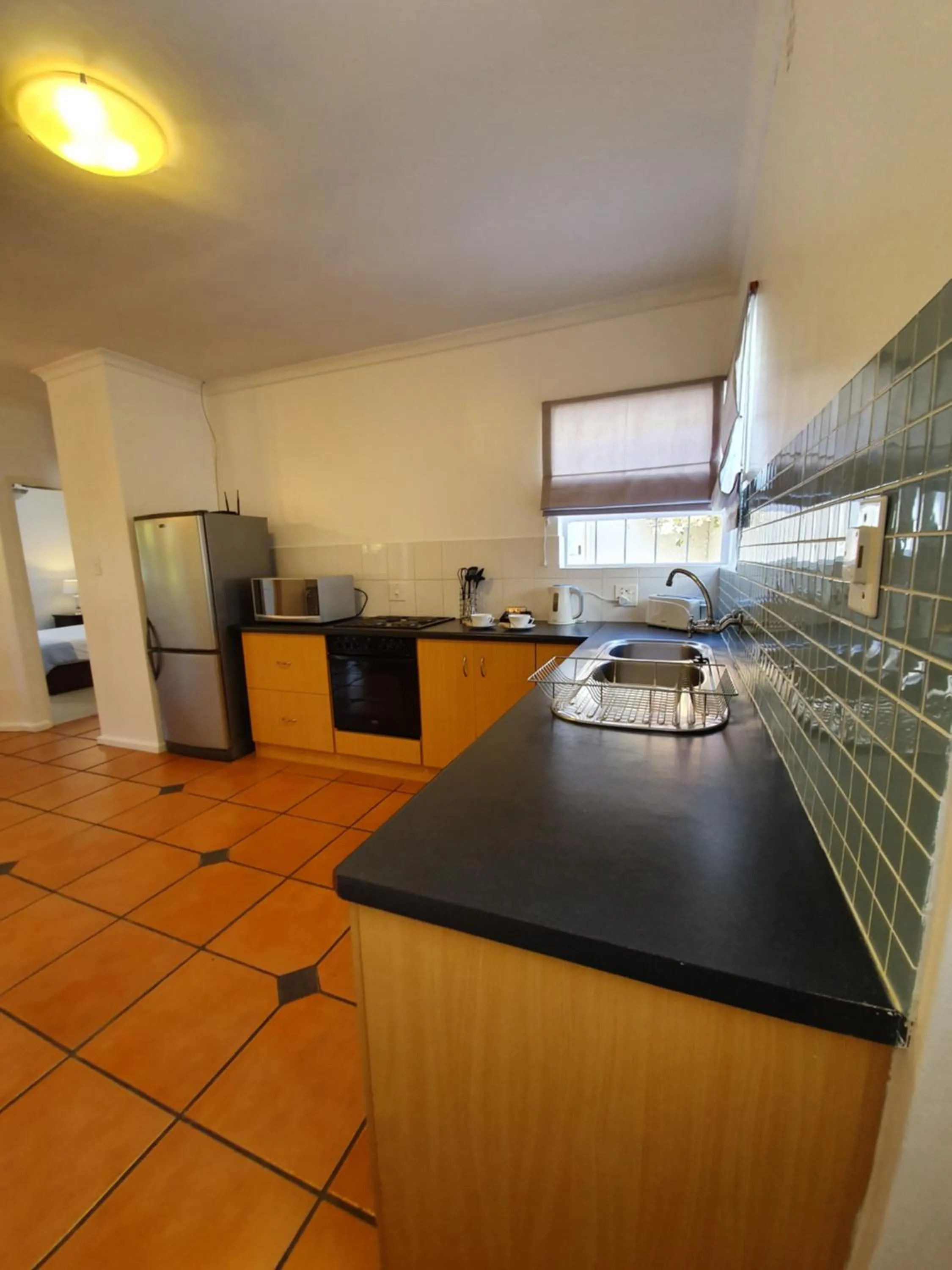 Kitchen or kitchenette in Paradiso Guesthouse & Self-catering Cottage