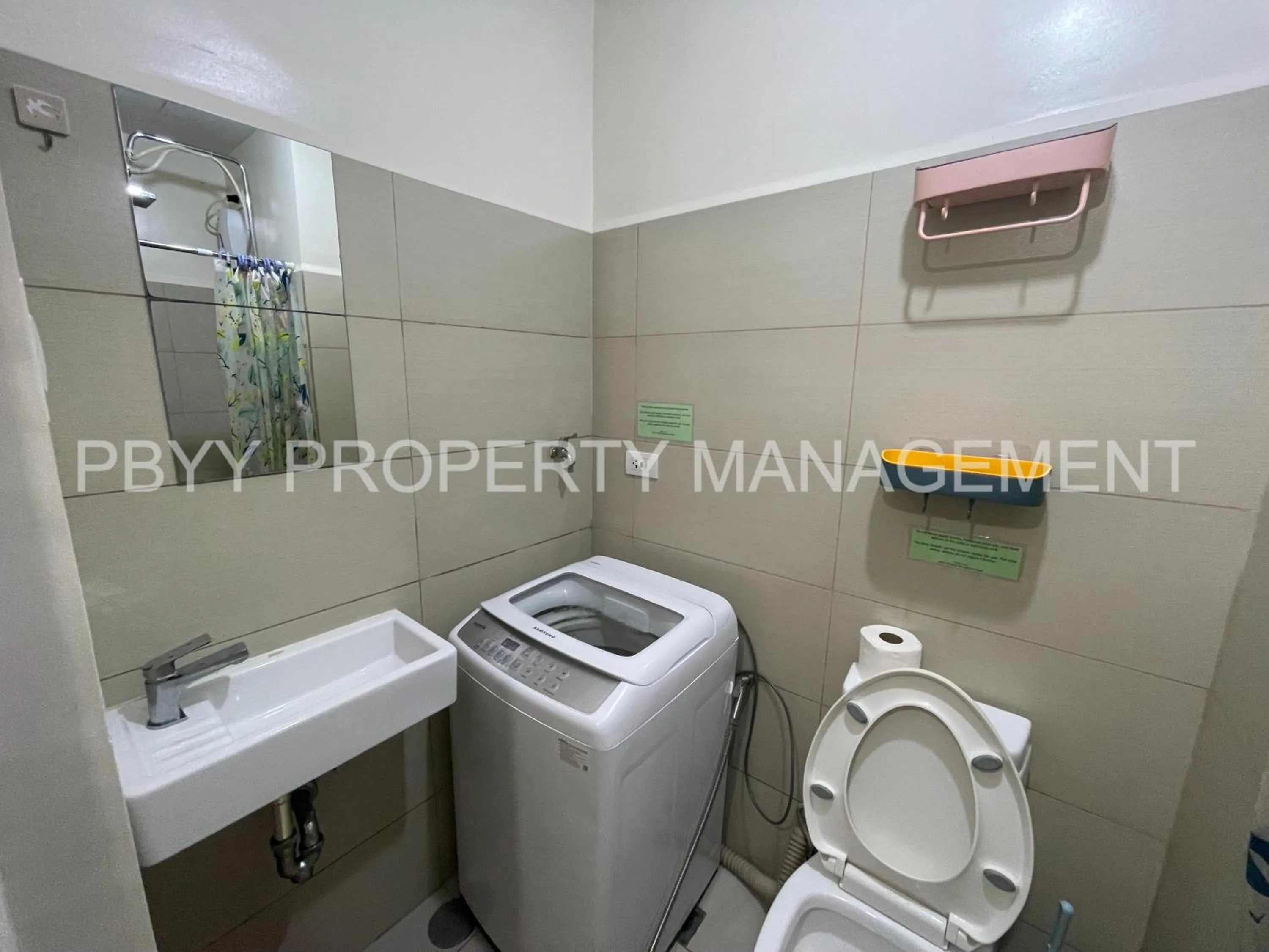 Bathroom in Green Residences Stays by PBYY