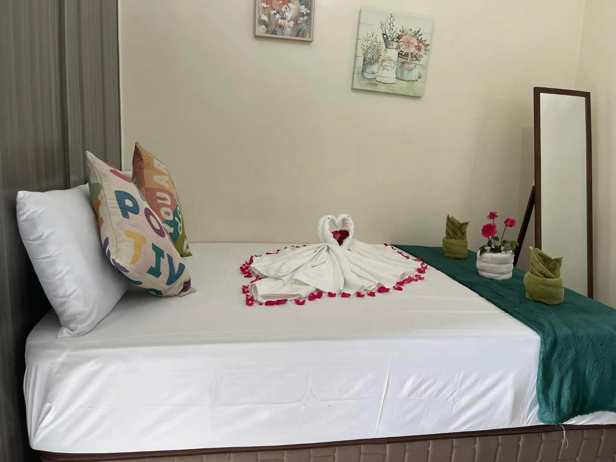 Bed in Green Residences Stays by PBYY