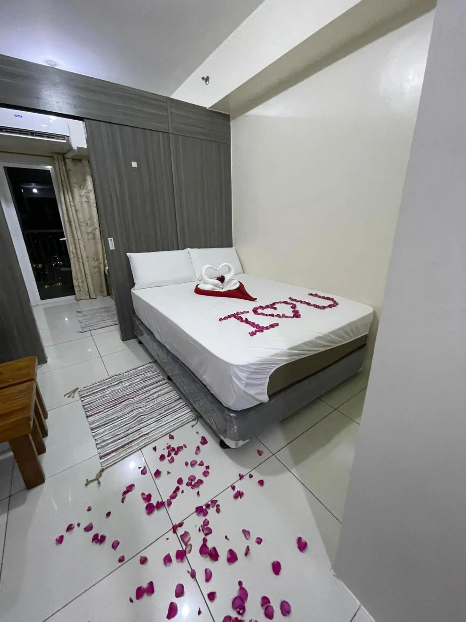 Bed in Green Residences Stays by PBYY