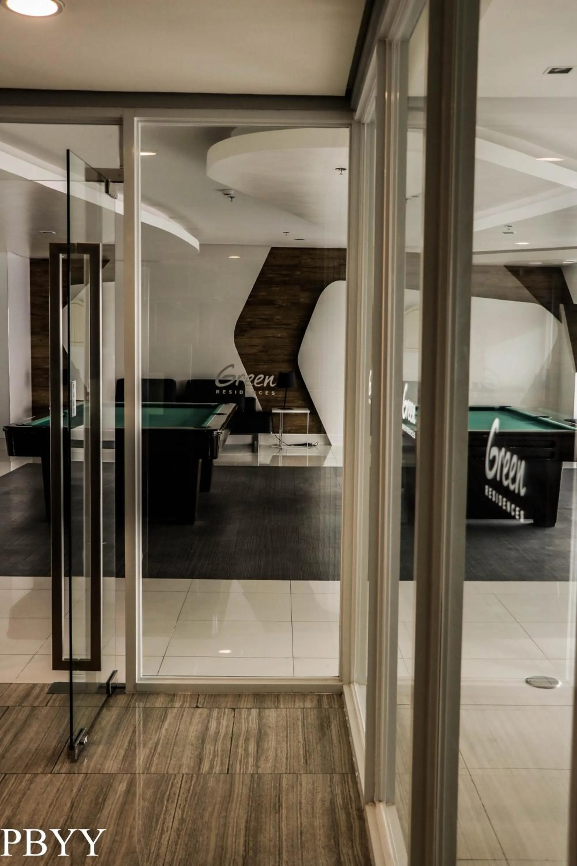 Billiard in Green Residences Stays by PBYY